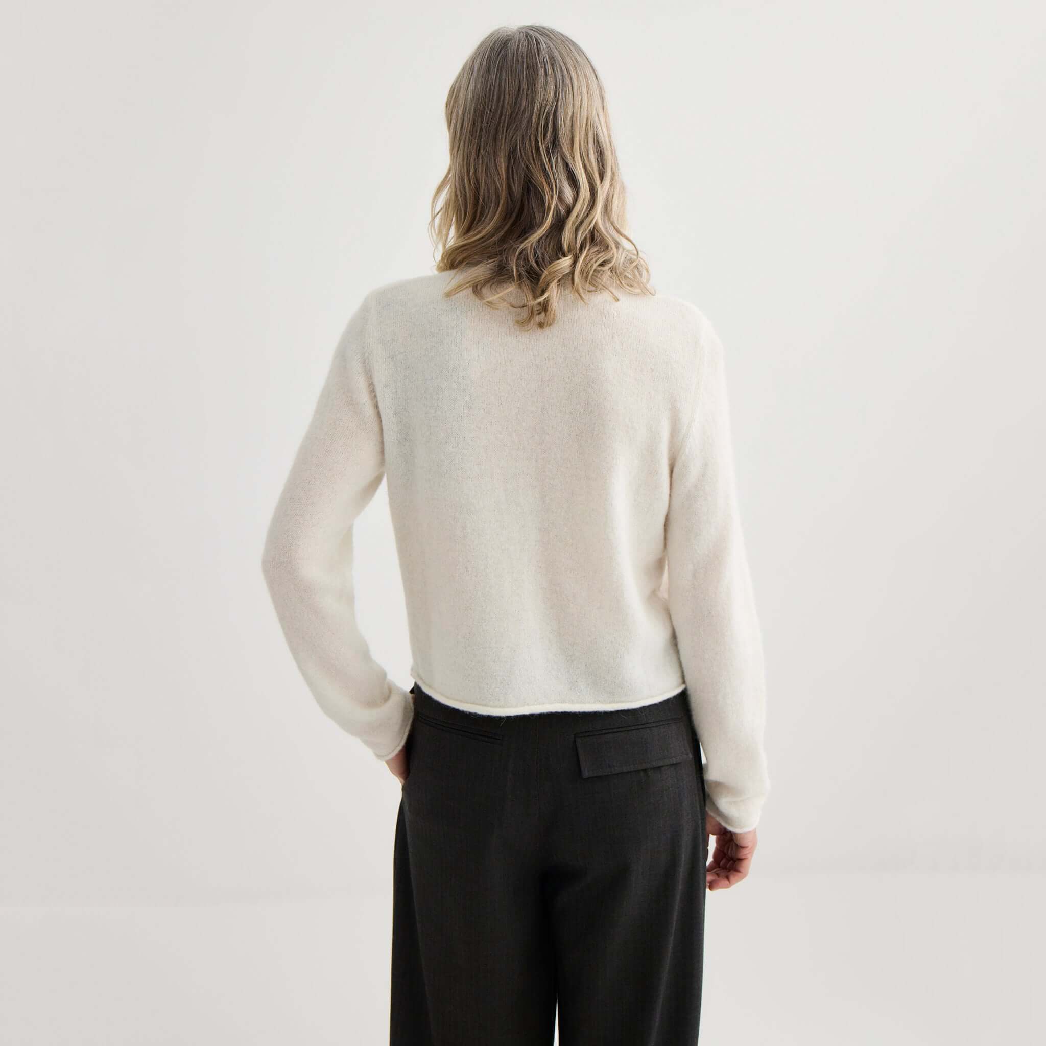 Alt Tag: Laing Alpaca / Merino Cropped Cardigan - Ivory back view, soft ivory knit with rolled hems, lightweight warm layering cardigan