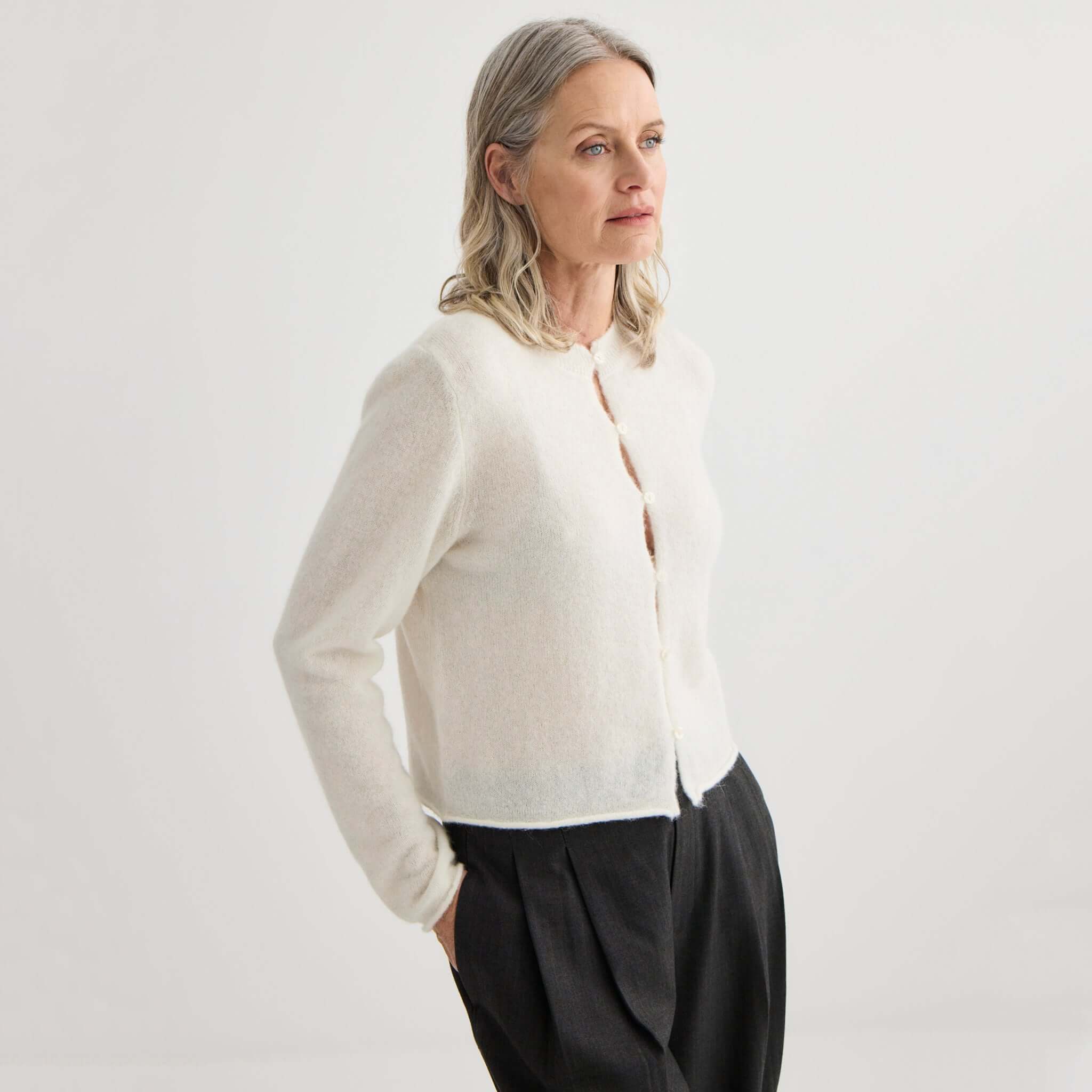 Alt Tag: Laing Alpaca / Merino Cropped Cardigan - Ivory on model, soft lightweight knit with cropped fit for effortless layering