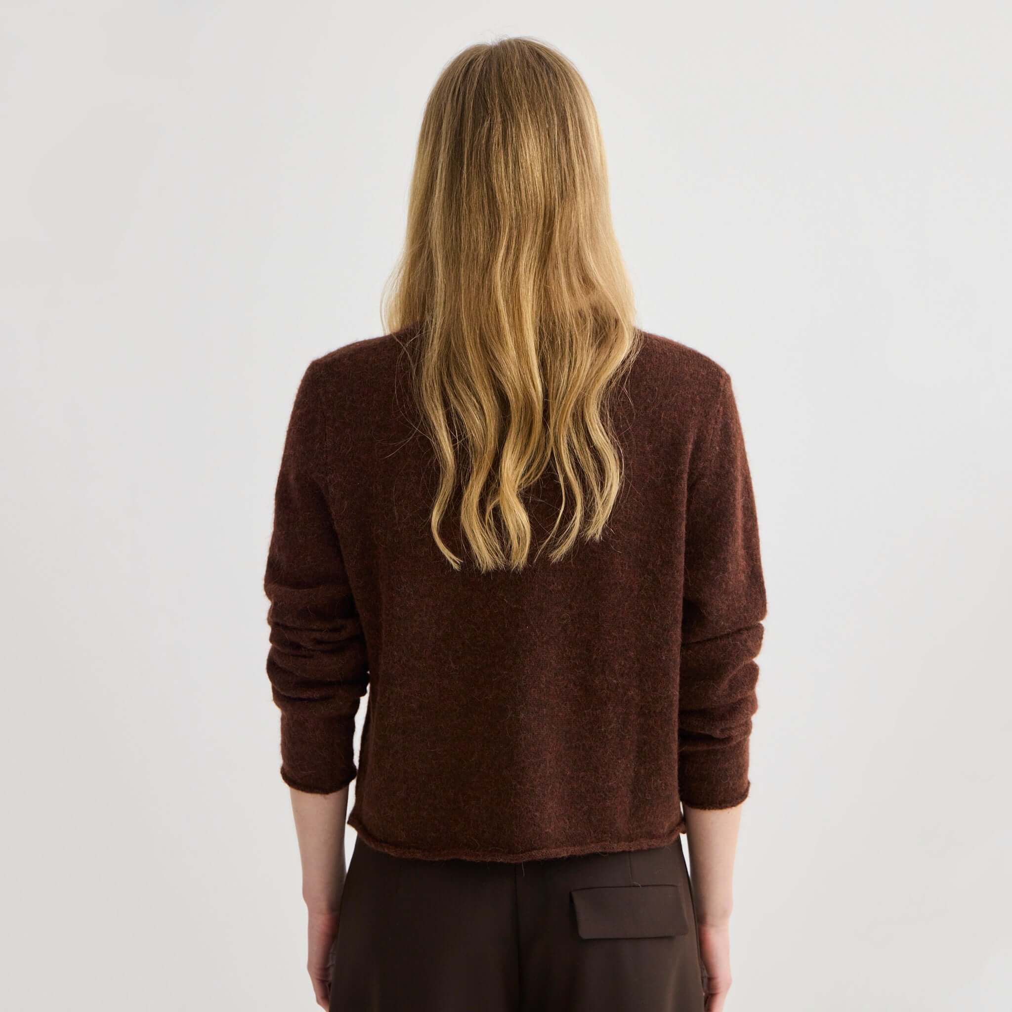 Alt Tag: Laing Alpaca / Merino Cropped Cardigan - Mahogany Marle back view, soft alpaca merino knit cropped cardigan with rolled hems