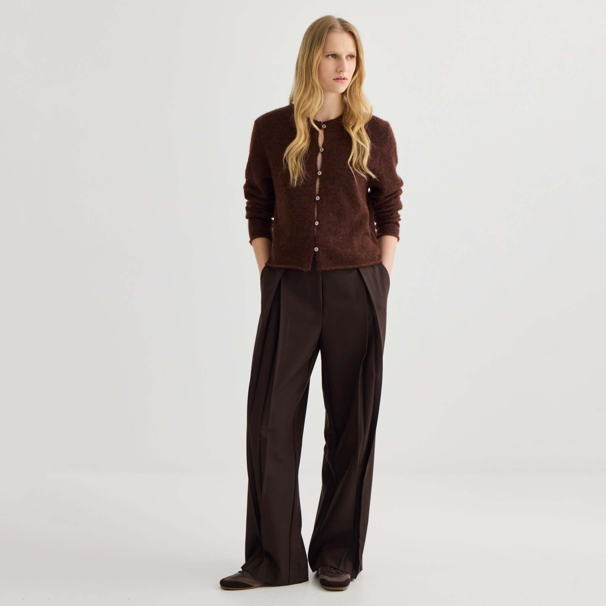 Alt Tag: Laing Alpaca / Merino Cropped Cardigan - Mahogany Marle worn by model, soft alpaca-merino knit cropped cardigan with buttons