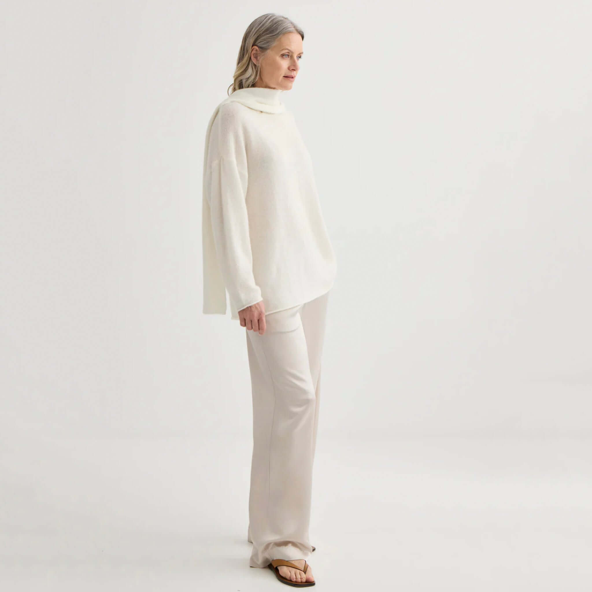 Alt Tag: Laing Alpaca Sweater with Tie - Ivory on model, soft lightweight alpaca-blend knit with elegant drape in refined ivory