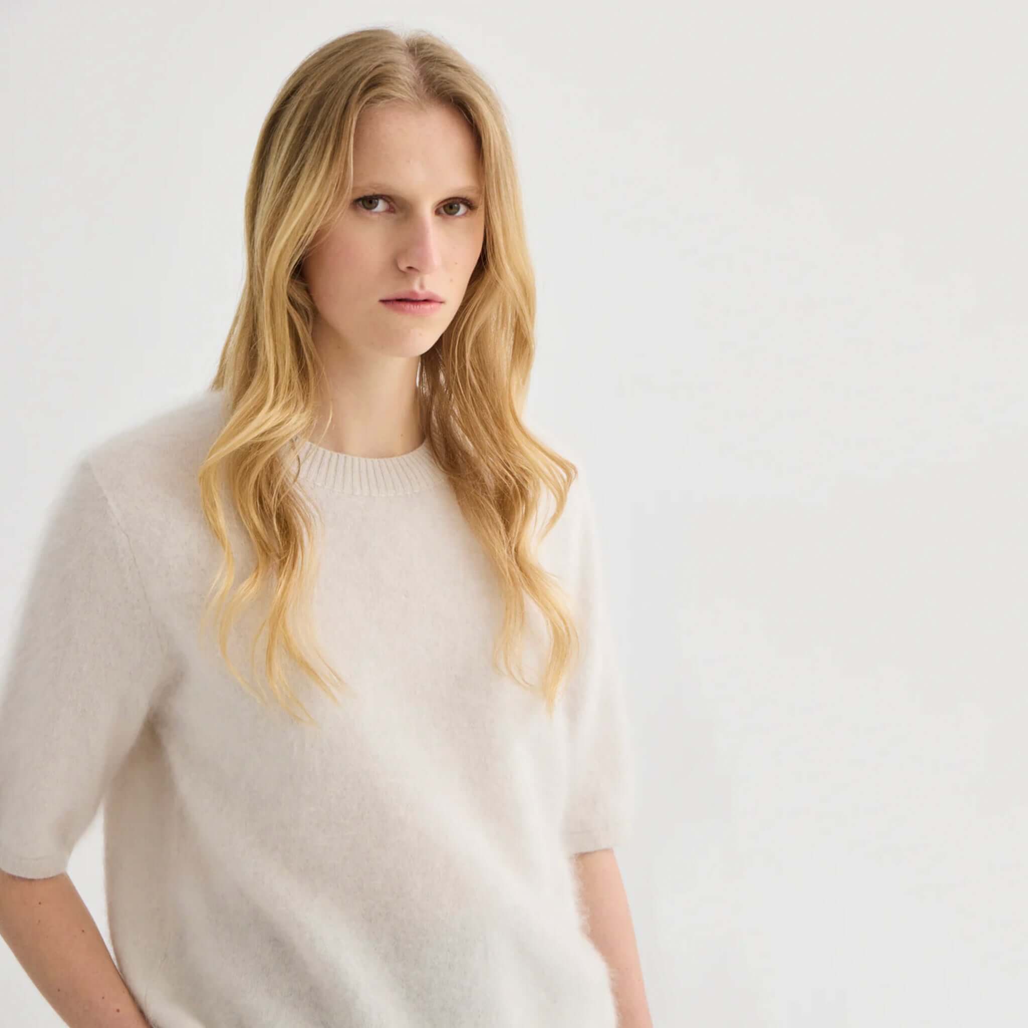 Alt Tag: Laing Brushed Cashmere T Shirt - Oyster on model, cloud-soft brushed 100% Grade A cashmere tee in elegant oyster hue