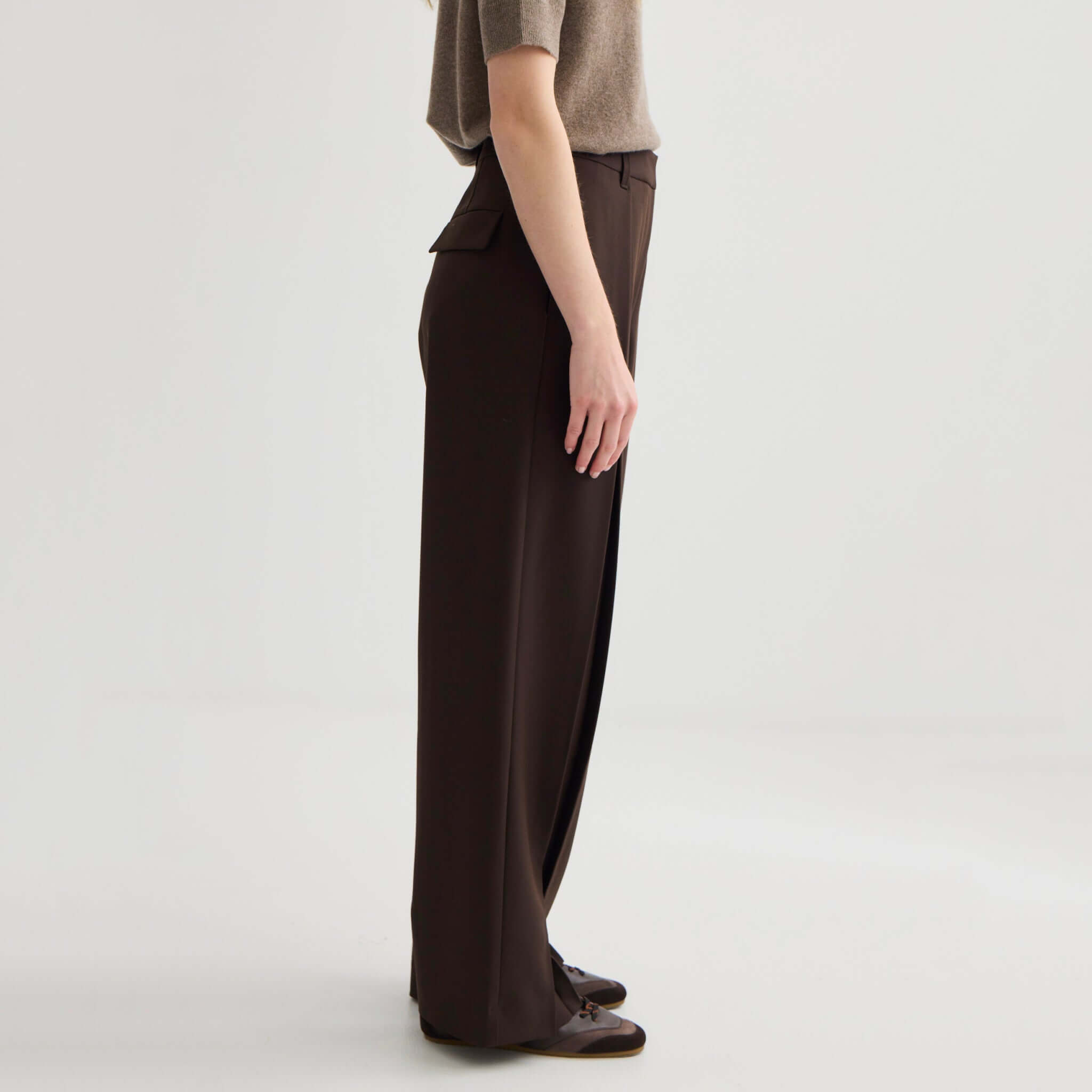 Alt Tag: Laing Invert Pleat Pants - Truffle women’s wide-leg trousers in truffle, side view with inverted pleat detail