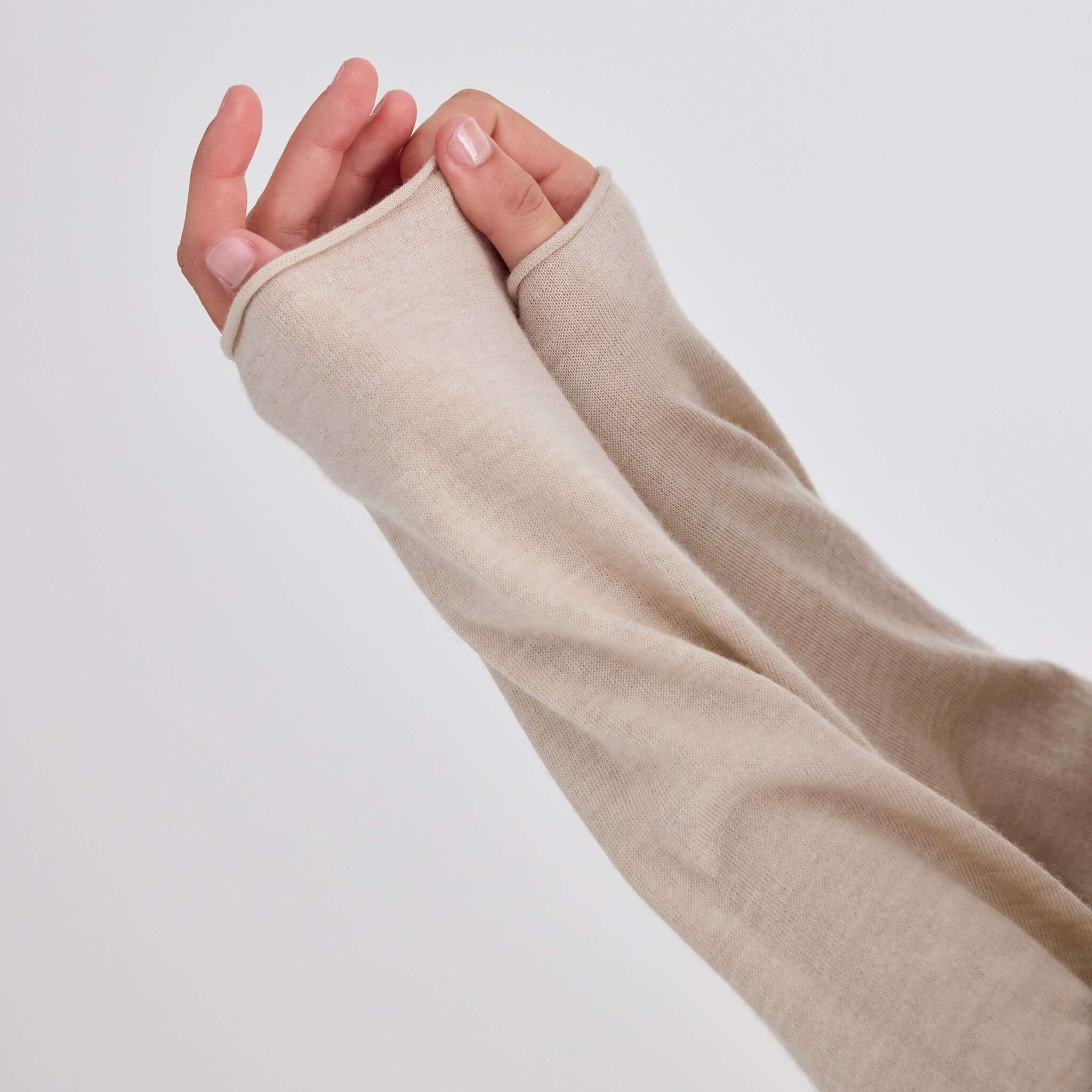 Laing Liv V-Neck Merino Cardigan - Sand close-up of sleeves showing fine knit detail.