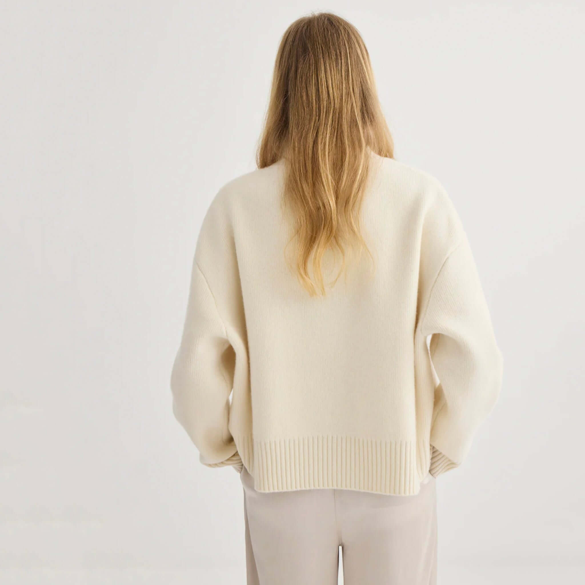 Laing Nico Merino Oversized Sweater - Cream back view showcasing its slouchy silhouette and ribbed details.