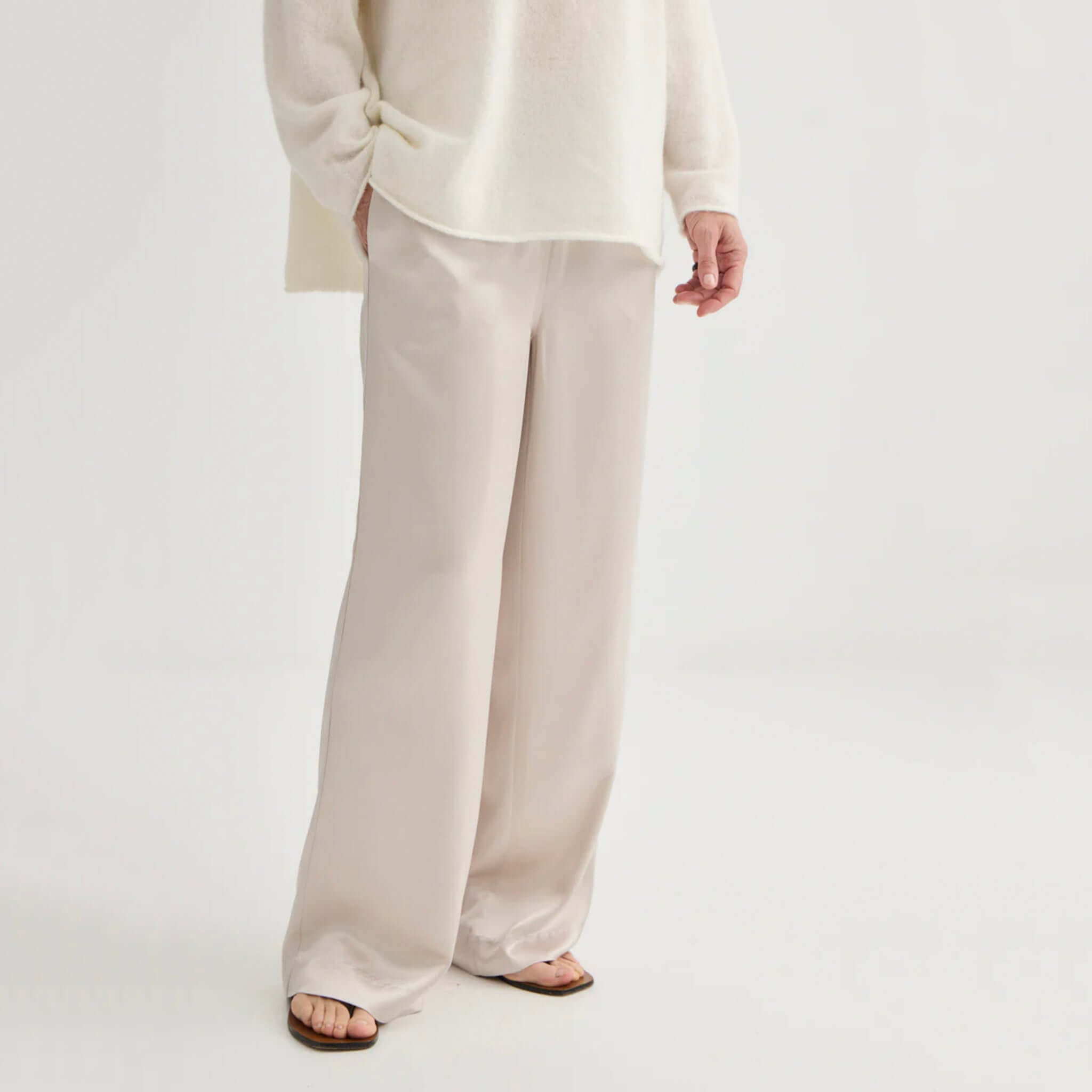 Alt Tag: Laing Satin Relaxed Pants - Champagne wide-leg satin trousers in soft champagne tone, luxe drape and elegant movement