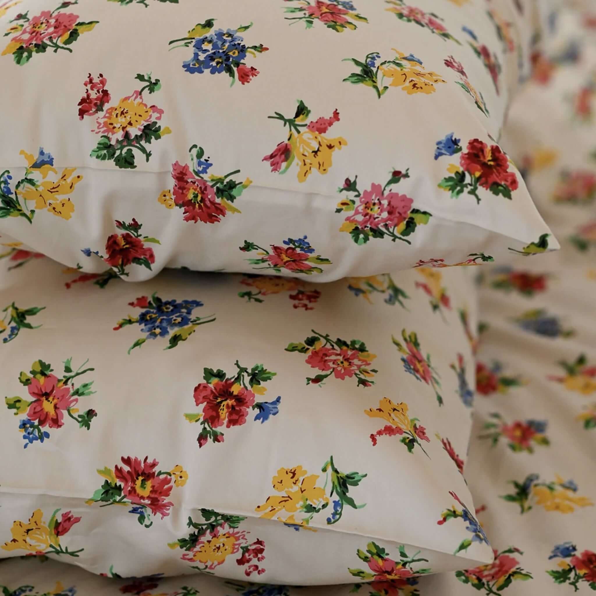 Alt Tag: Lazybones Organic Cotton Bedlinen Set - Meadow vintage floral organic cotton sateen pillowslips on aged cream background