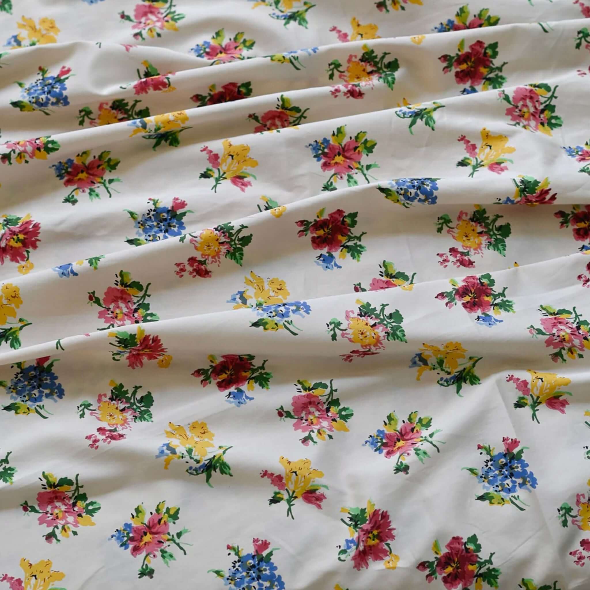 Alt Tag: Lazybones Organic Cotton Bedlinen Set - Meadow floral organic cotton sateen sheets with bright posies on aged cream background