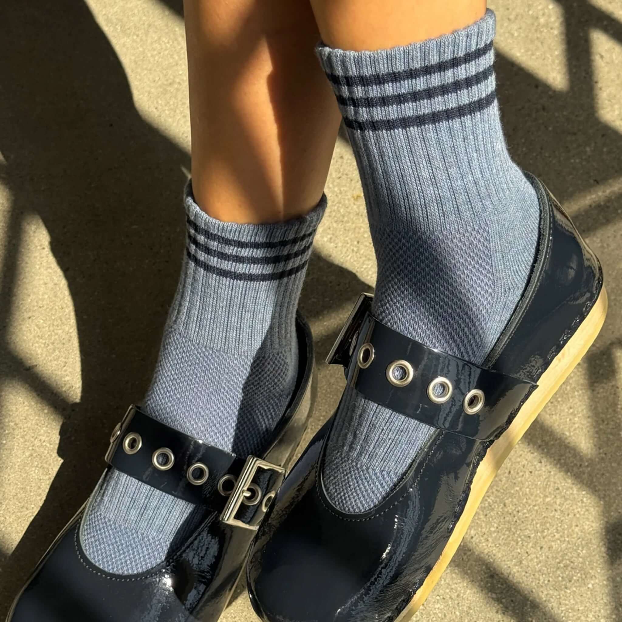 Le Bon Shoppe Girlfriend Socks - Indigo worn with stylish shoes, showcasing a triple contrast stripe design.