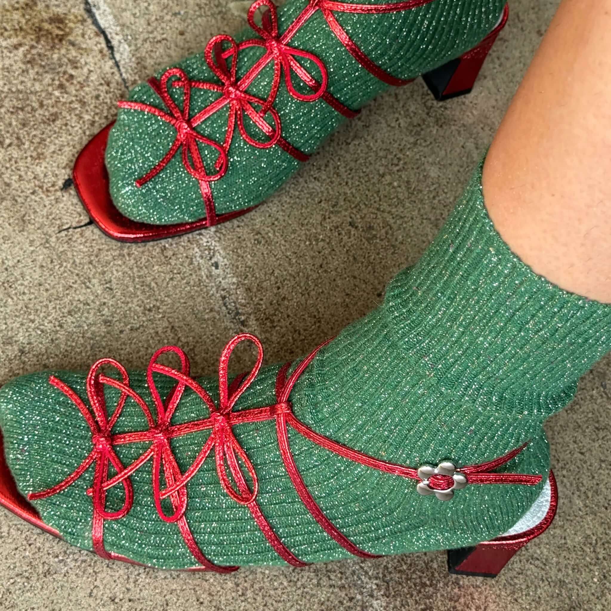 Le Bon Shoppe Winter Sparkle Socks - Evergreen styled with red heels, showcasing sparkly comfort in winter fashion.