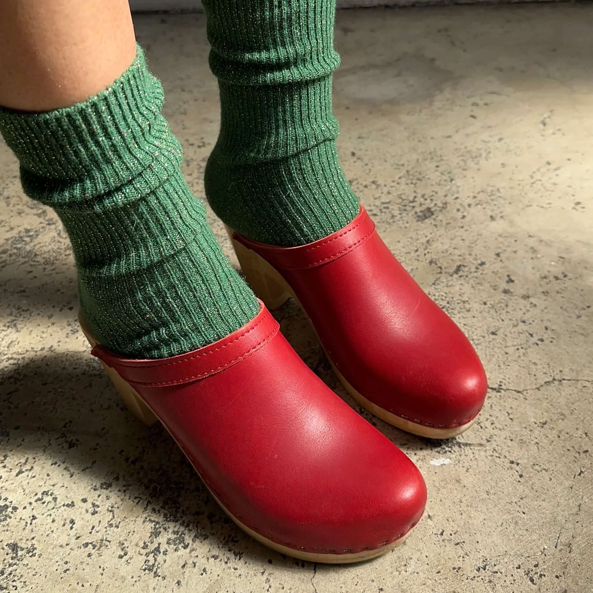 Le Bon Shoppe Winter Sparkle Socks - Evergreen styled with red clogs, perfect for winter fashion.