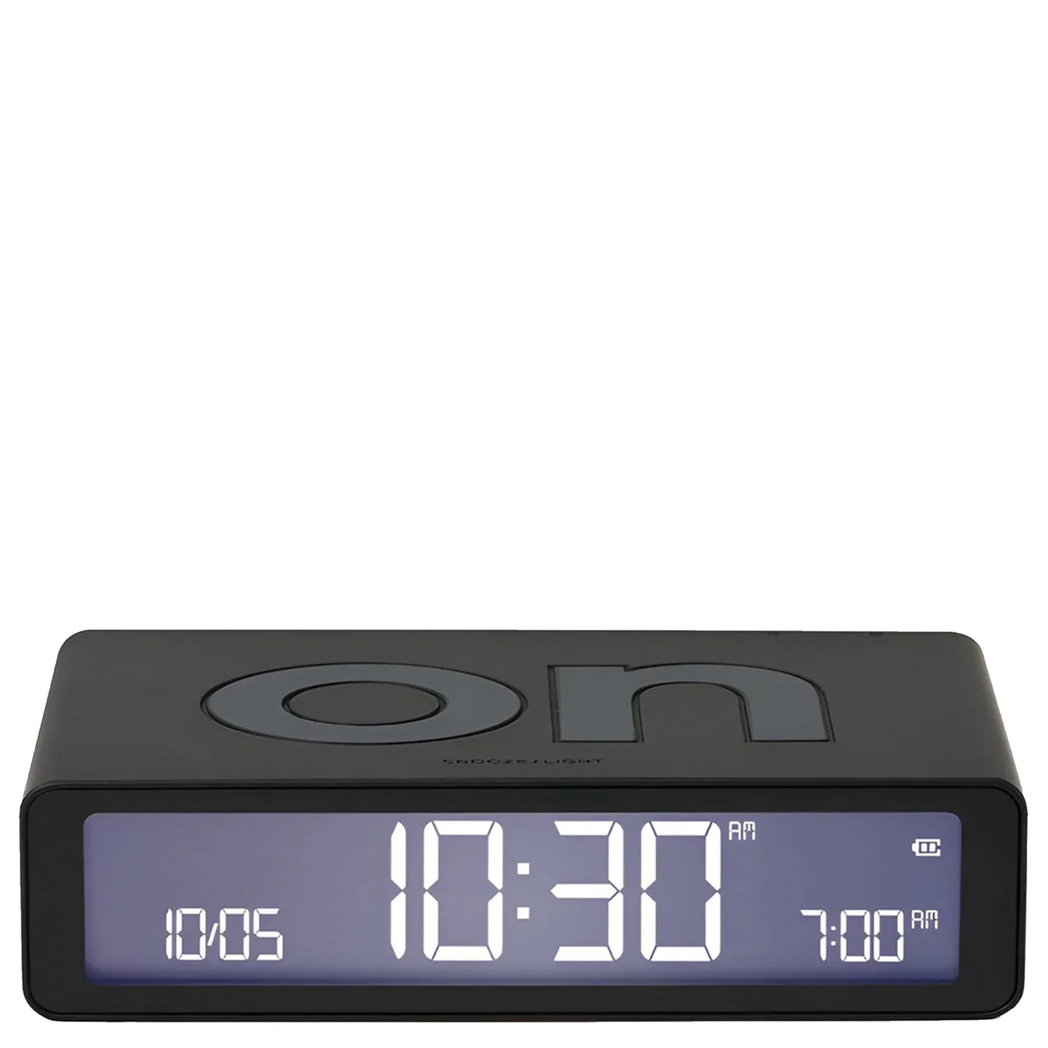 A black Lexon Flip Classic reversible LCD alarm clock displaying the time.