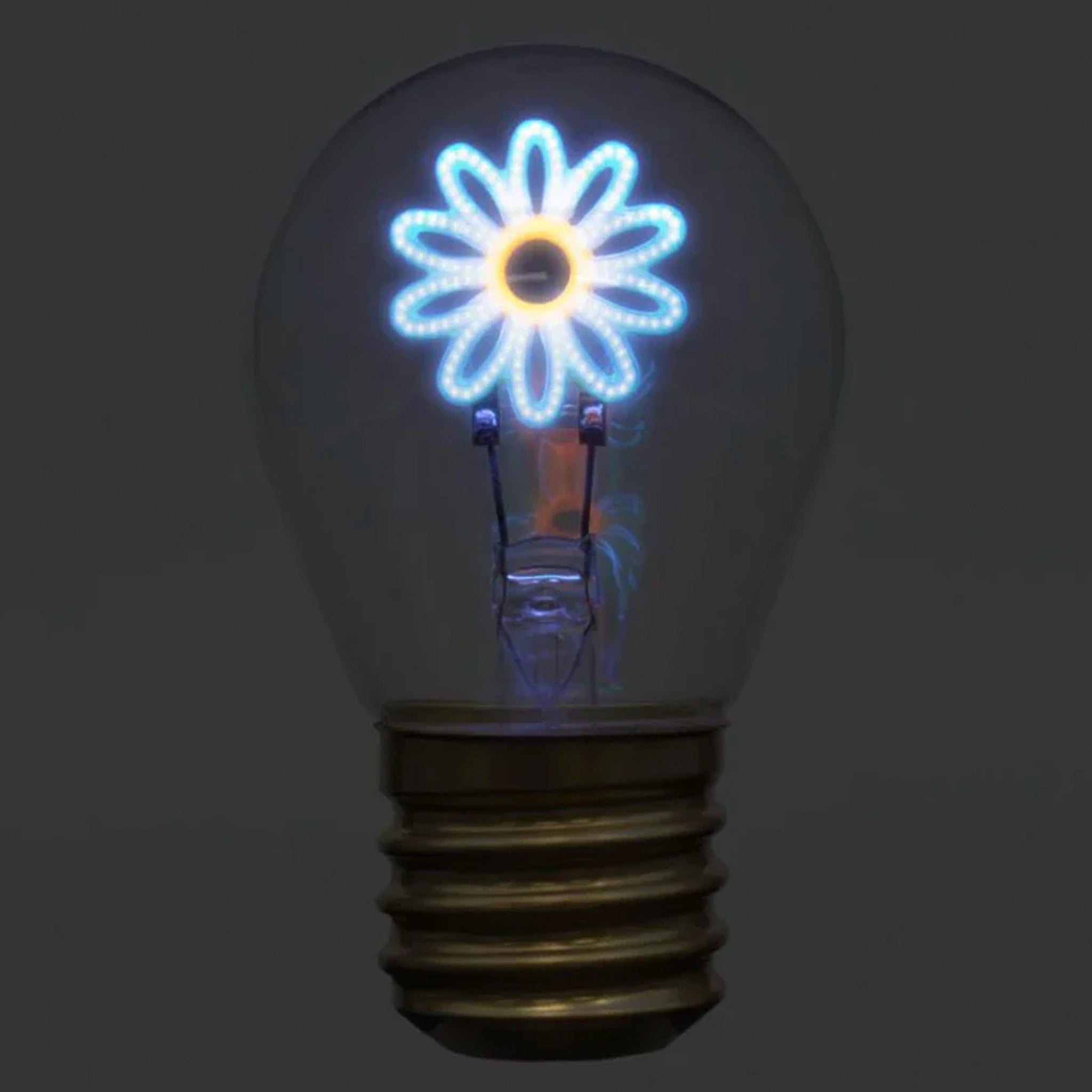 Decorative light bulb with a flower-shaped design on a dark background