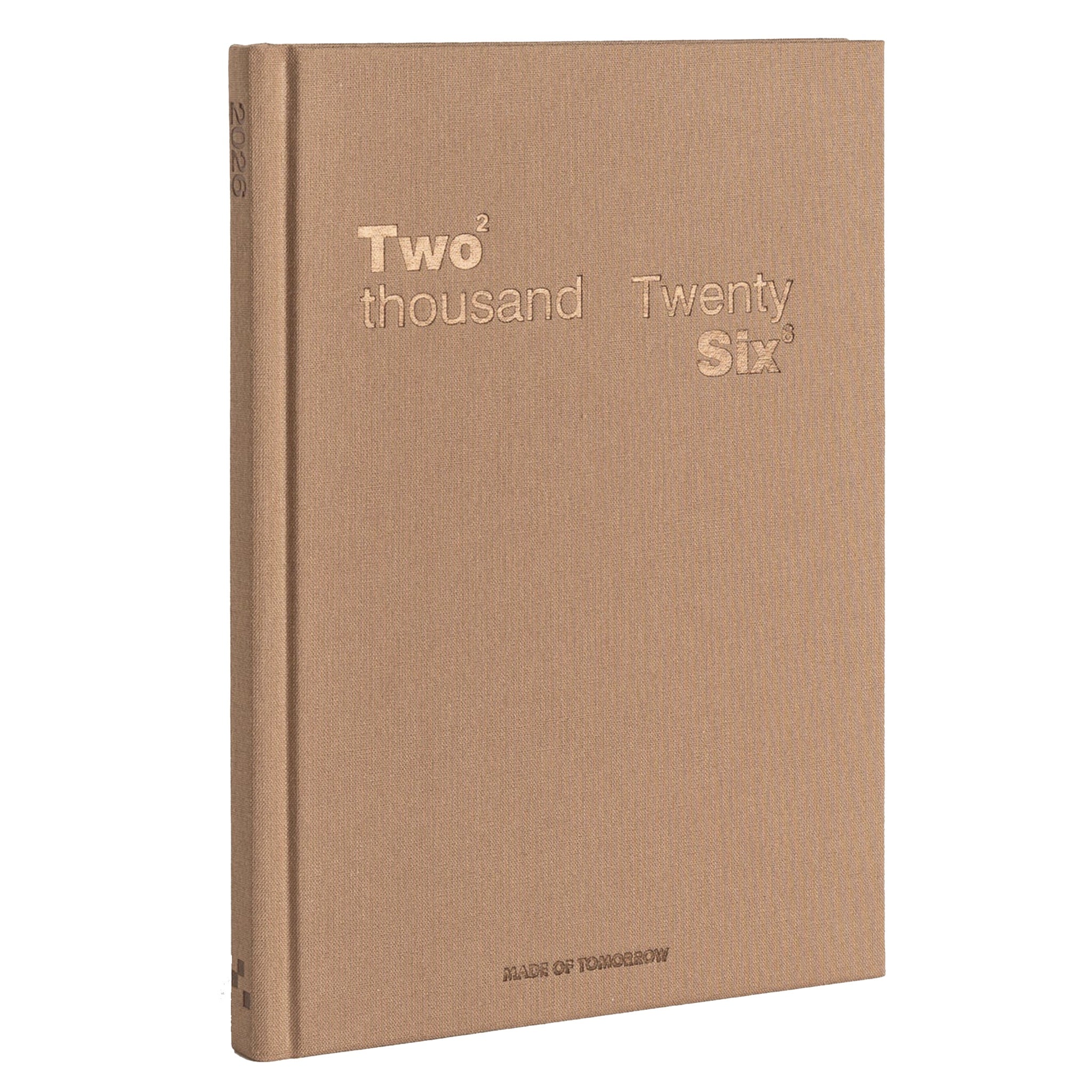 Brown notebook with 'Two thousand Twenty Six' embossed on the cover