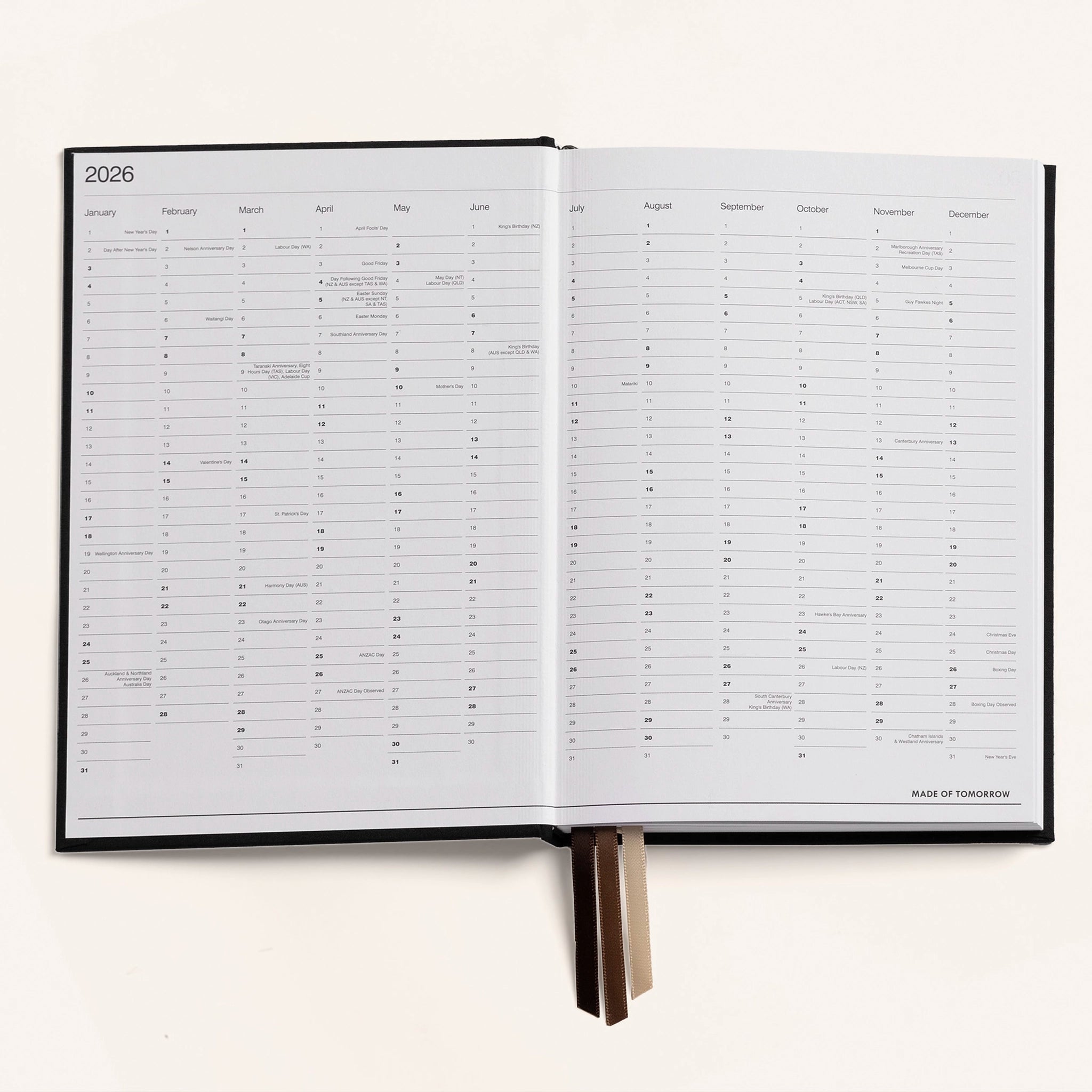 Open planner with a white page on a white background