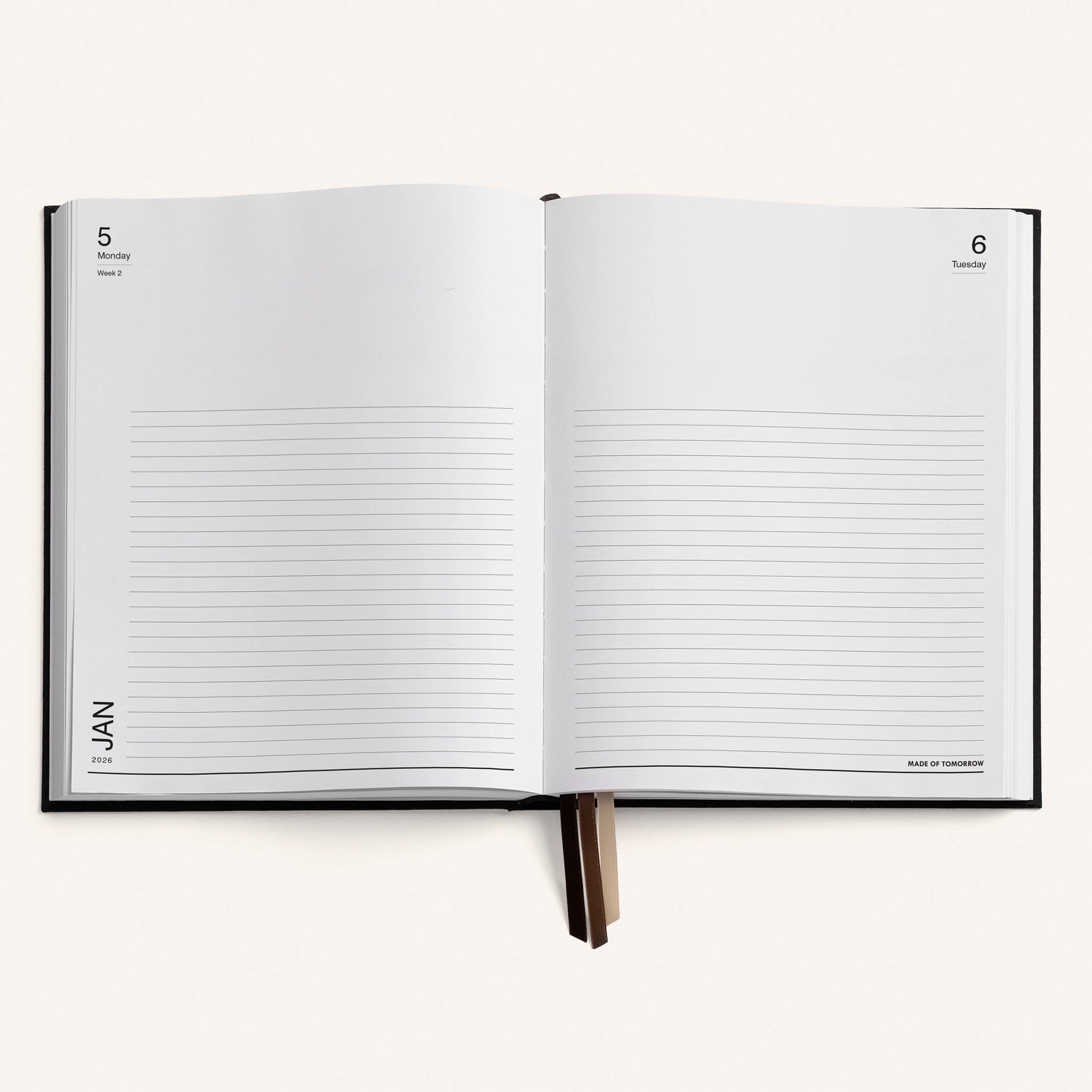 Open notebook with lined pages on a white background