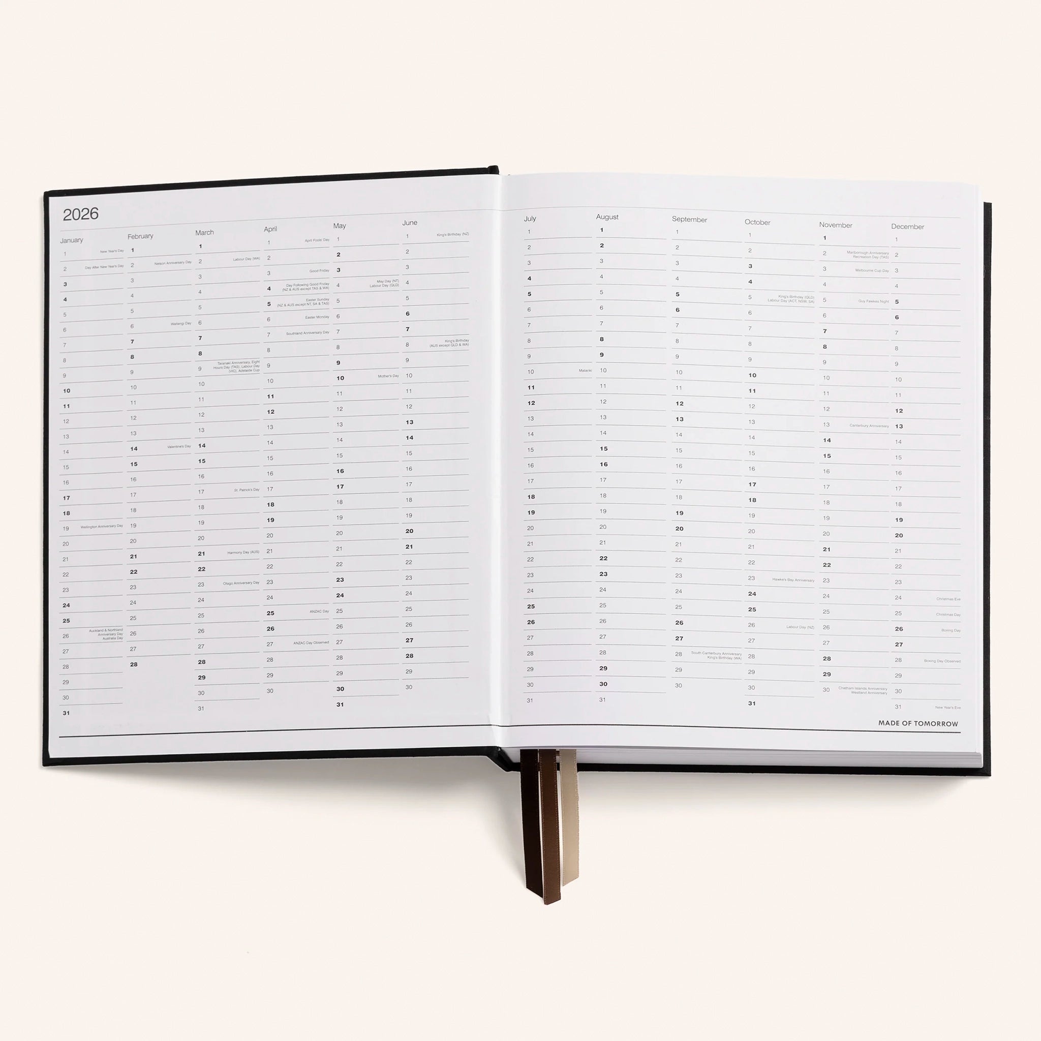 Open planner with monthly view on a white background