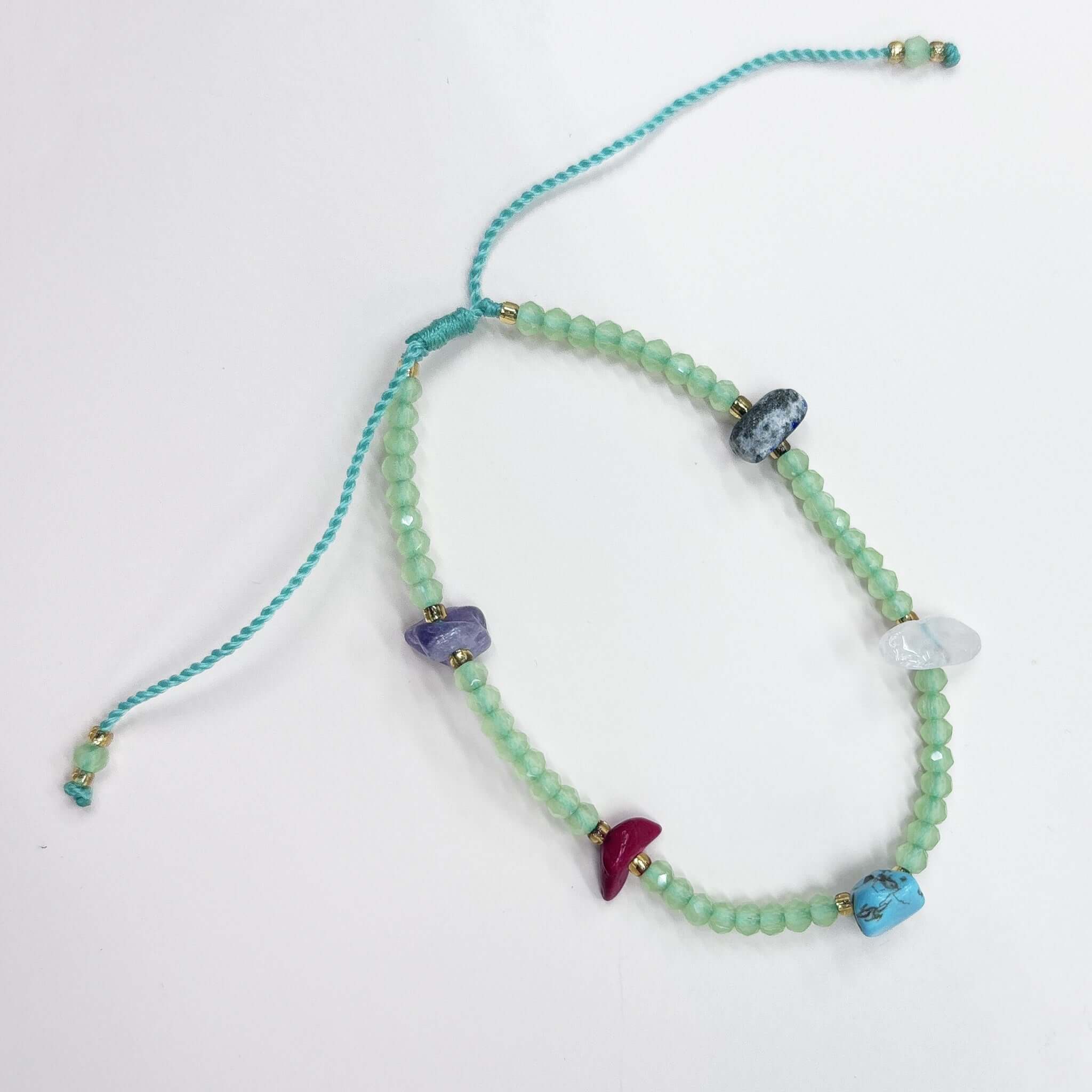Margaret Lucille Bracelet featuring faceted crystal and natural stone chip accents in mint color.