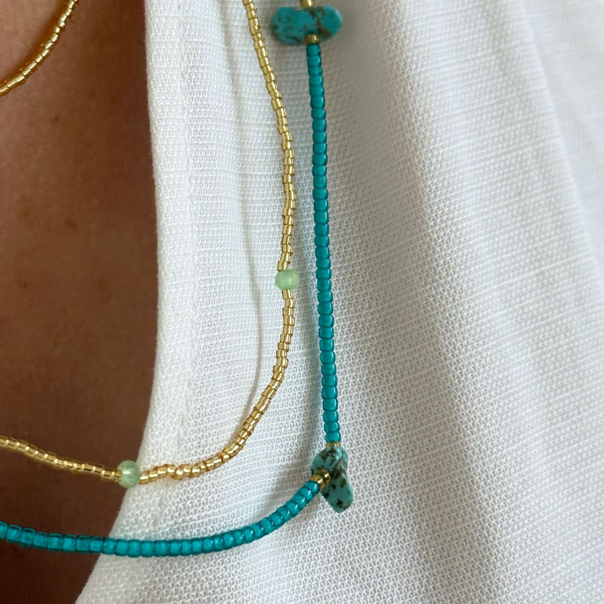 Margaret Cora Necklace featuring fine seed beads and raw stone accents for a colorful summer look.