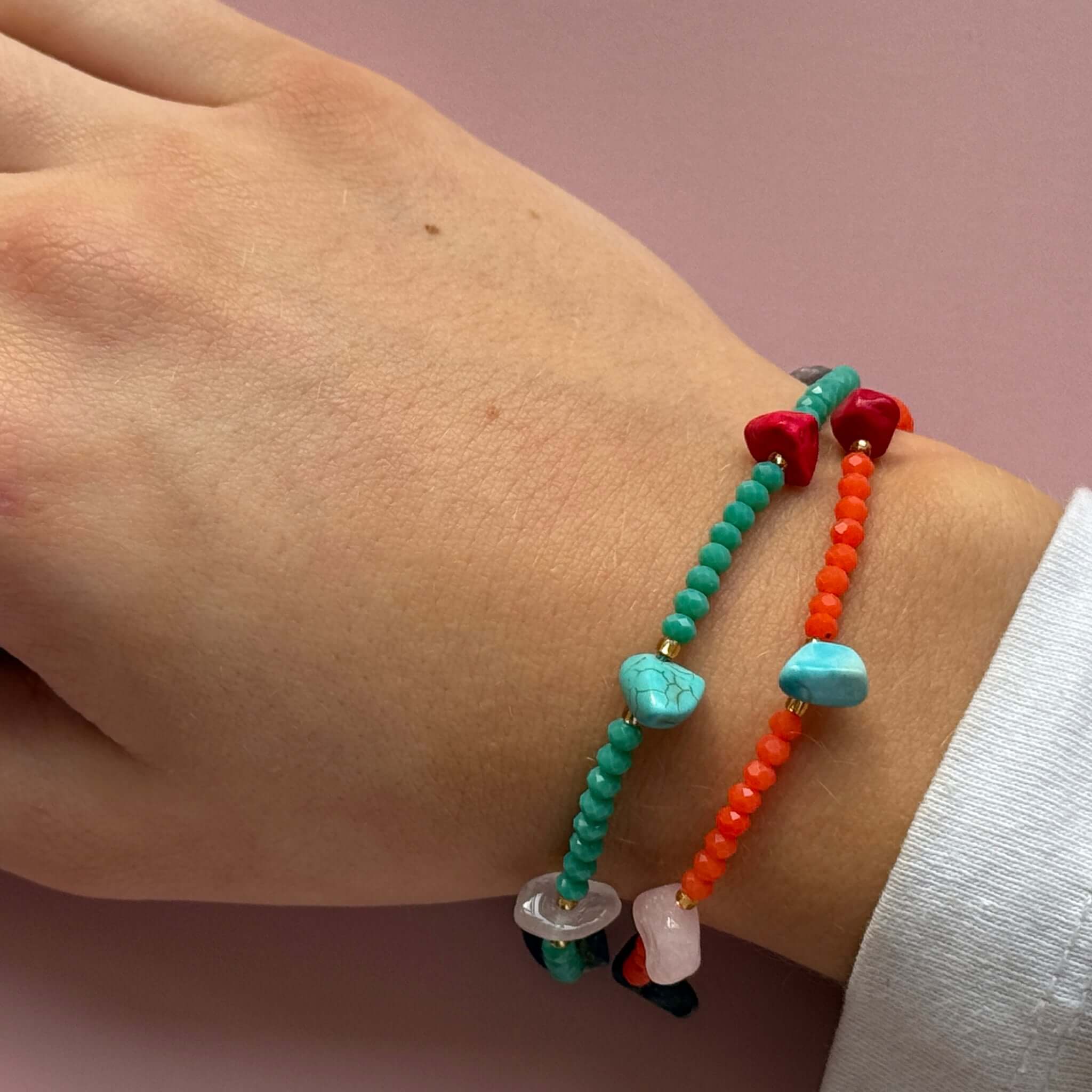 Margaret Lucille Bracelet showcasing colorful stones and beads in mint, coral, and teal on a wrist.