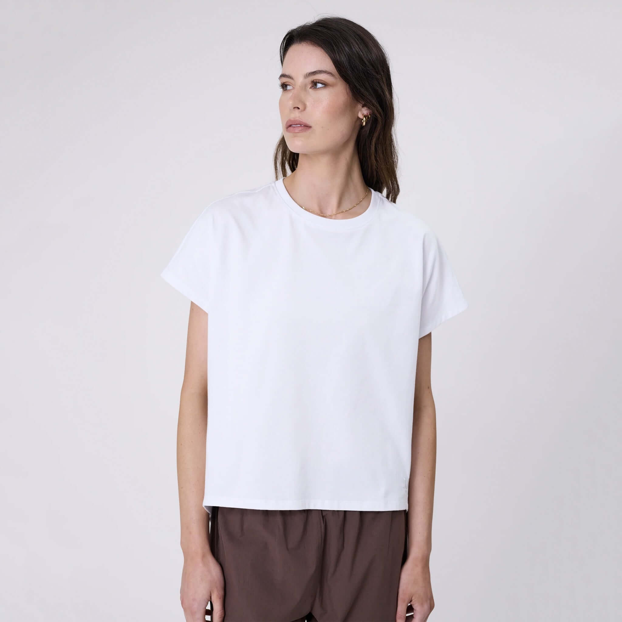 Marlow Barrel Tee - White displayed on a model, showcasing its relaxed fit and soft cotton fabric.