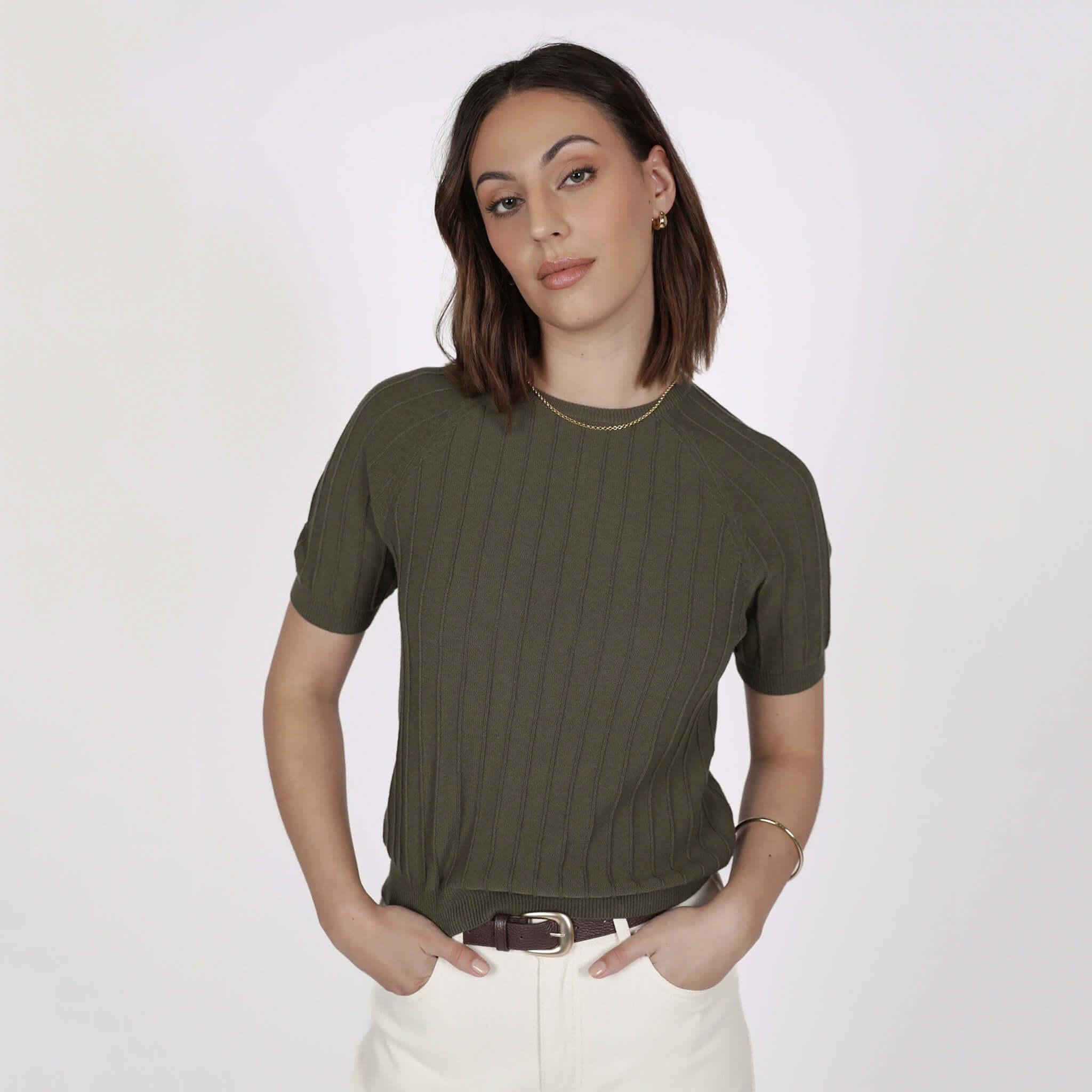 Marlow Soleil Knit Tee - Olive model showcasing textured knit fabric and relaxed fit in a minimalist setting.