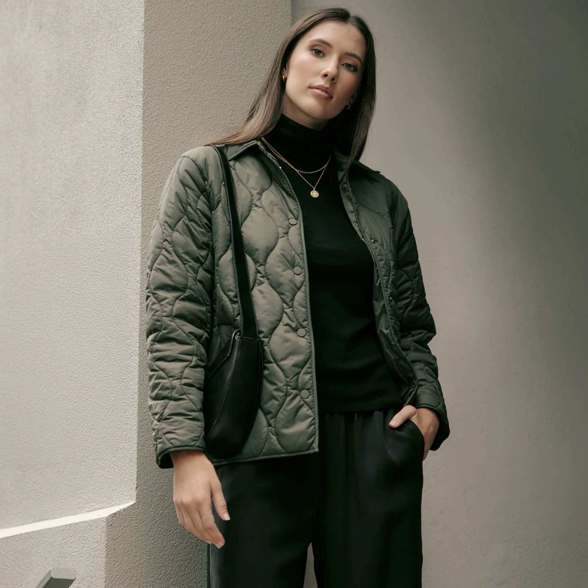 Marlow Toronto Quilted Jacket - Spruce worn by a model, showcasing its stylish quilted design and modern silhouette.