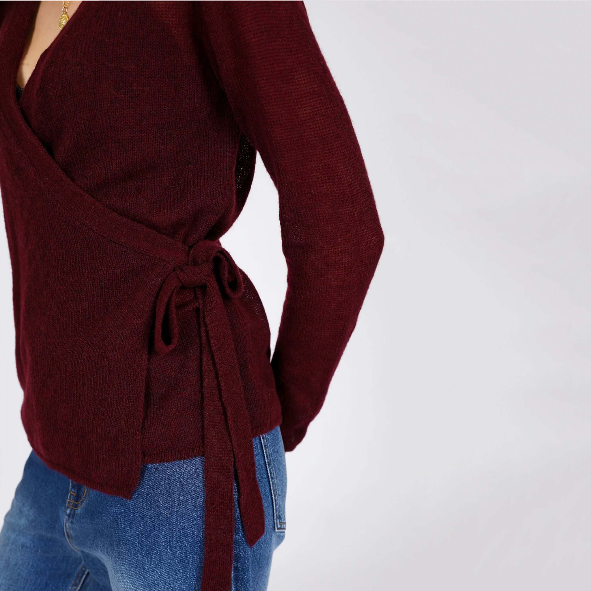 Alt Tag: Marlow Celeste Wool & Cashmere Wrap Knit - Oxblood women’s wrap cardigan with tie waist, lightweight soft knit side view