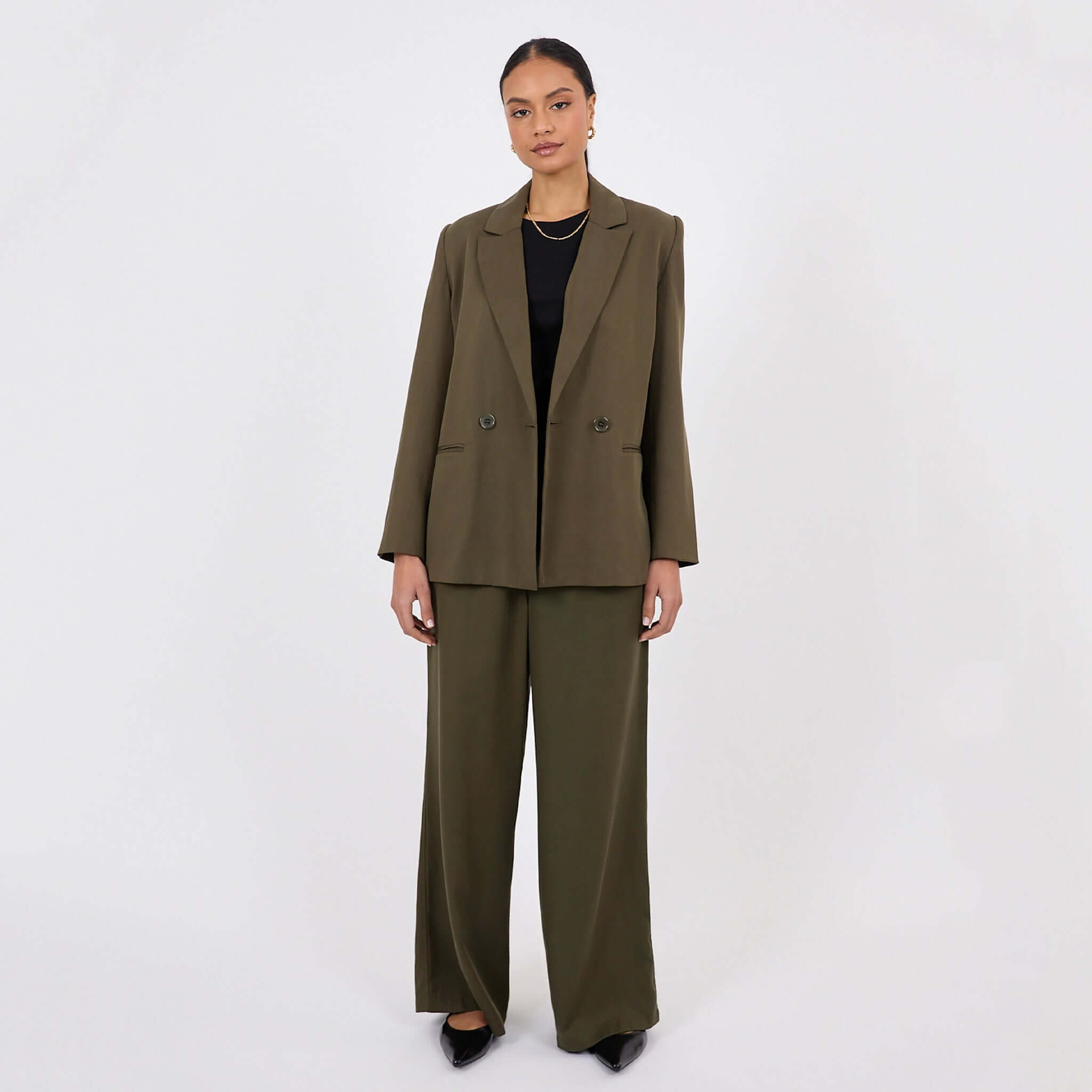 Marlow Eclipse Wide Leg Pants - Spruce worn with a matching blazer, featuring a double-breasted design and wide leg silhouette.