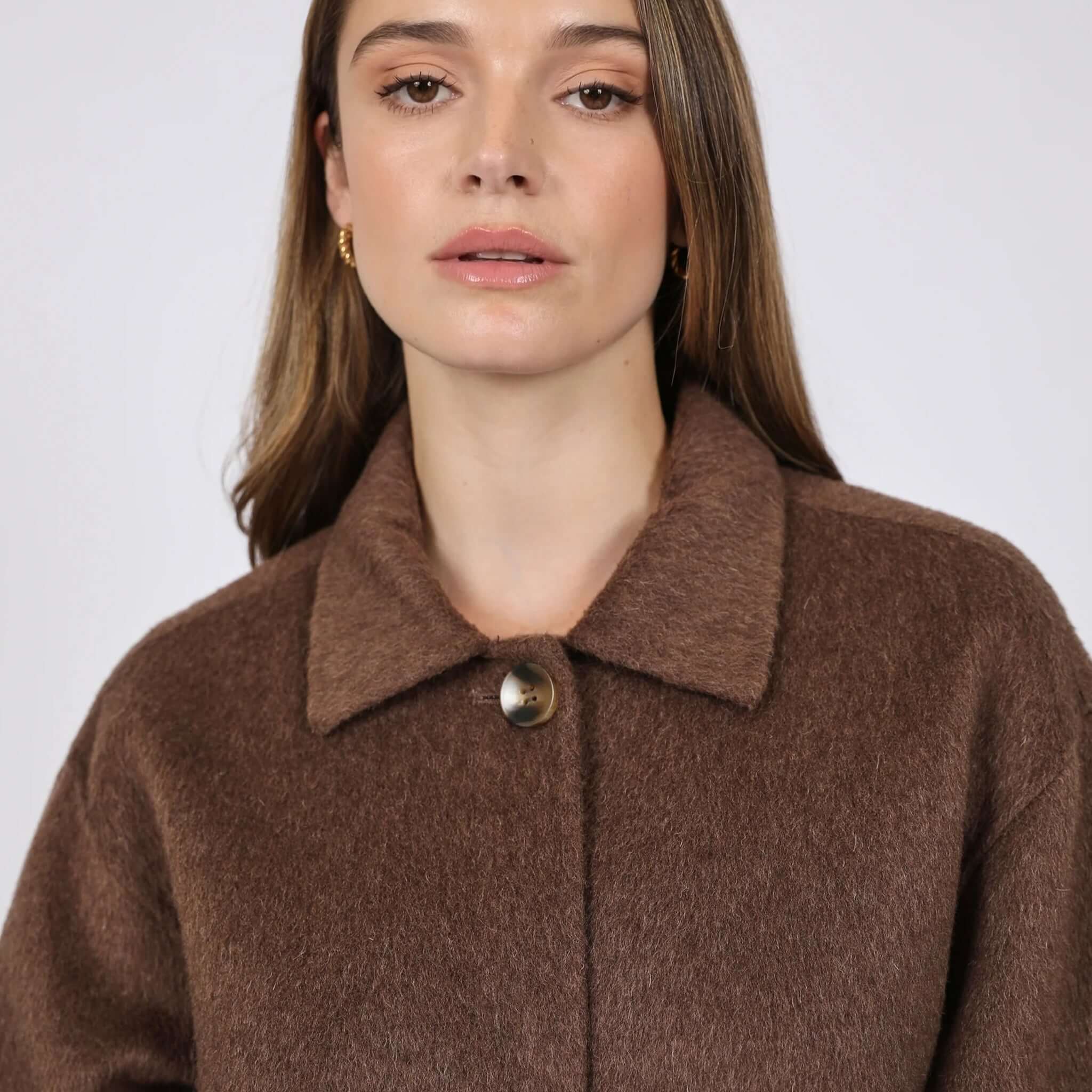 Marlow Loft Wool Coat - Mushroom featuring a model wearing the soft and structured wool coat in brown.