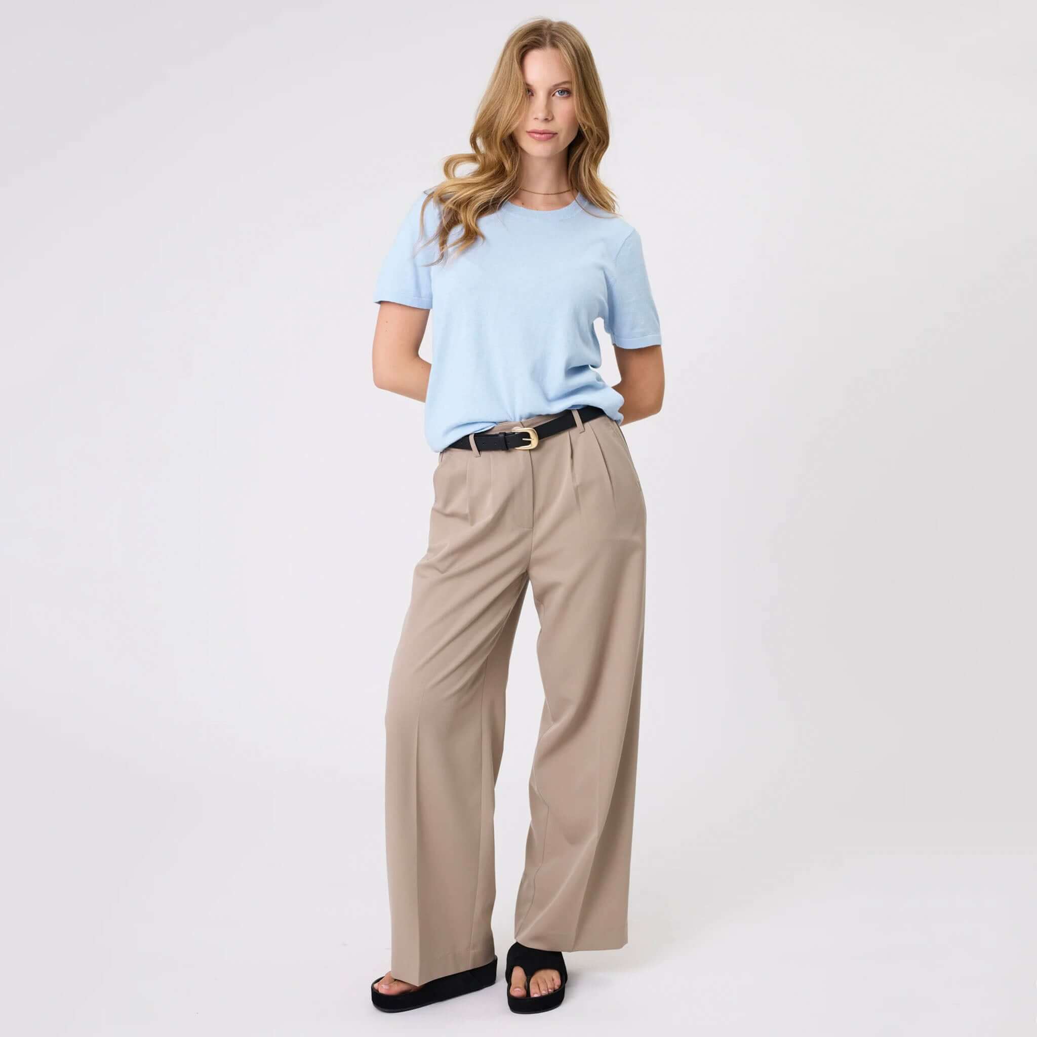 Alt Tag: Marlow Mode Pants - Ecru full-length wide leg pants with front pleats, elastic back and side pockets, styled with tee