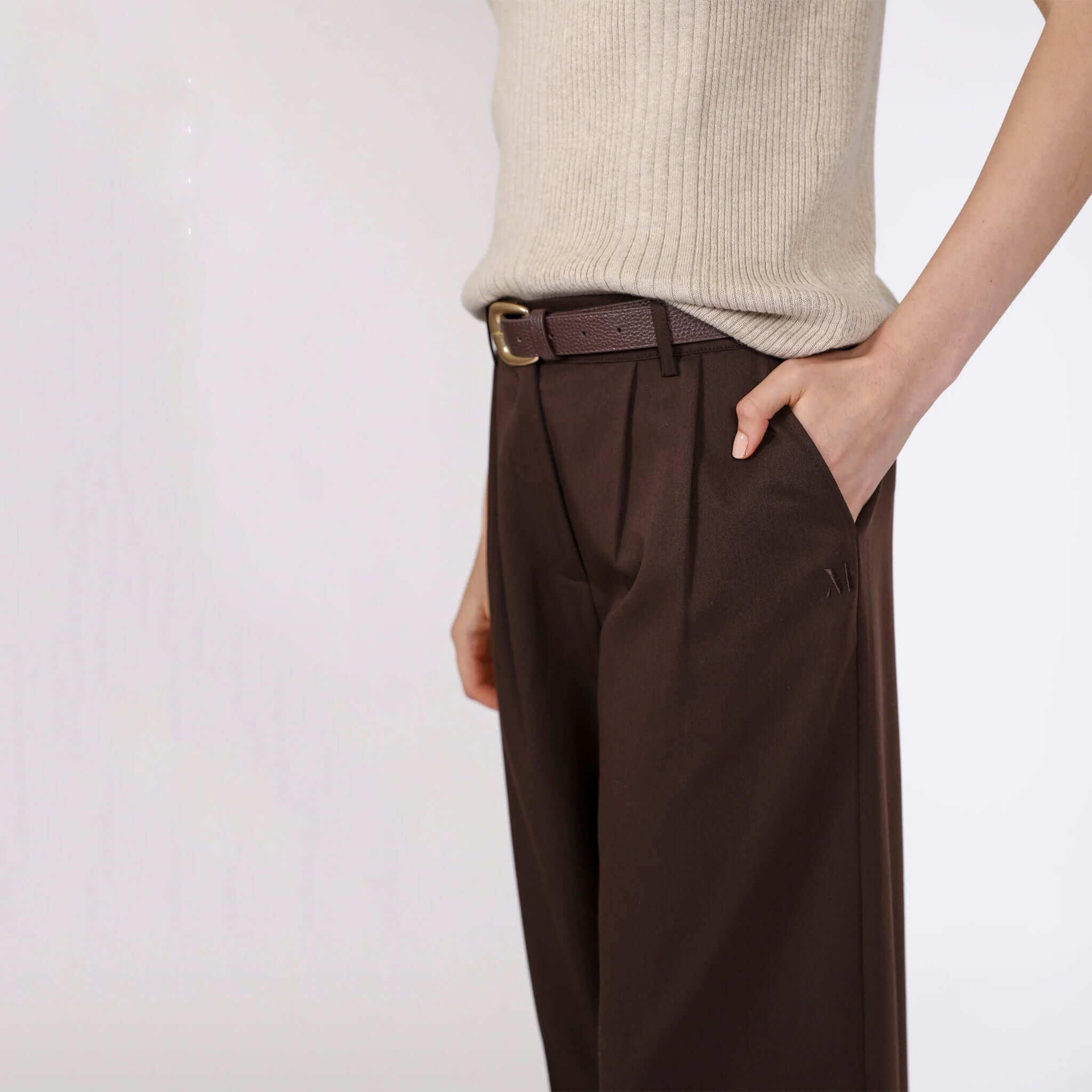 Alt Tag: Marlow Mode Pants - Java wide-leg pleated full-length pants in rich brown with belt and side pockets, styled with knit top
