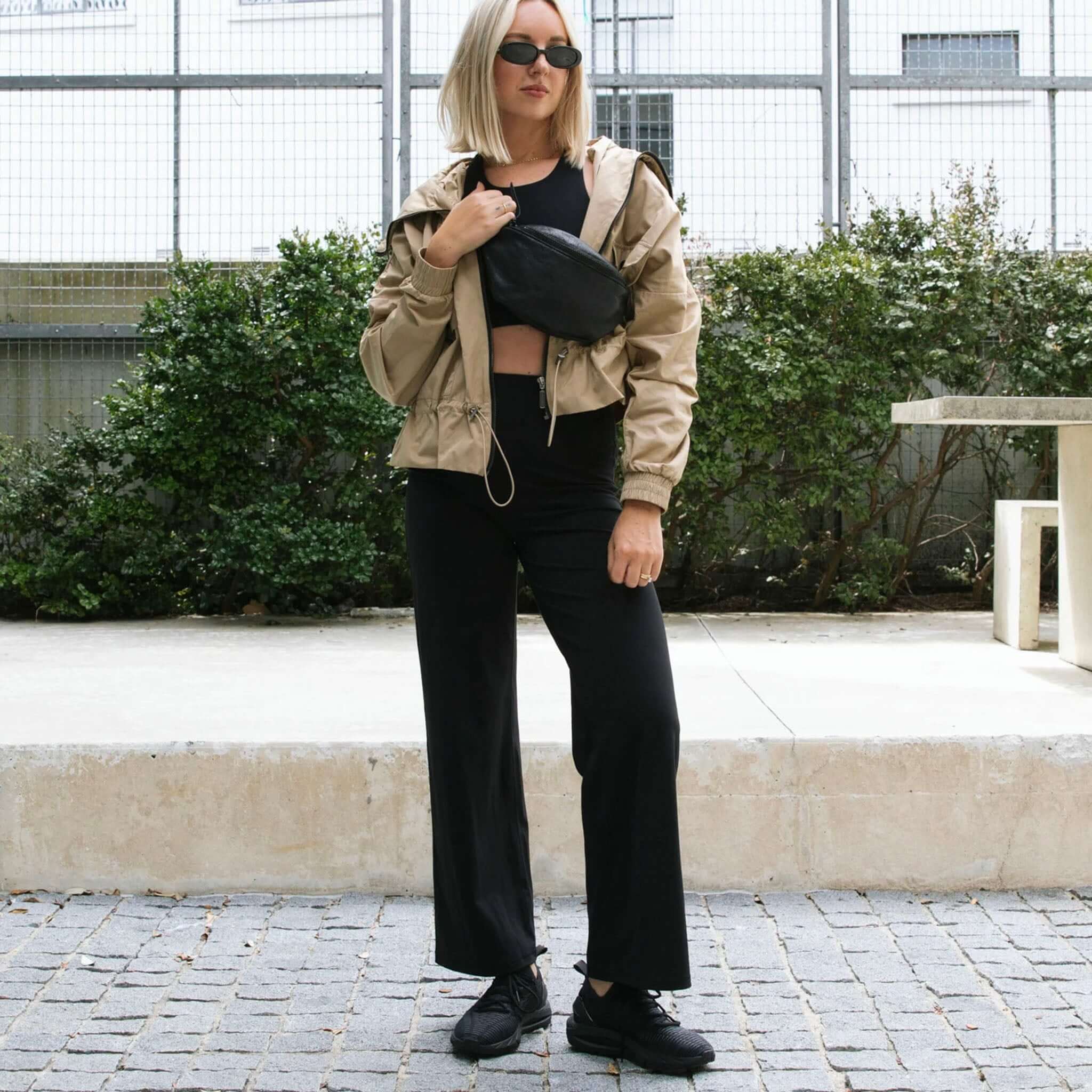 Alt Tag: Marlow Recharge Wide Leg Pants - Black on model with high-rise wide-leg fit, soft Airbrush Sculpt fabric for comfort and movement