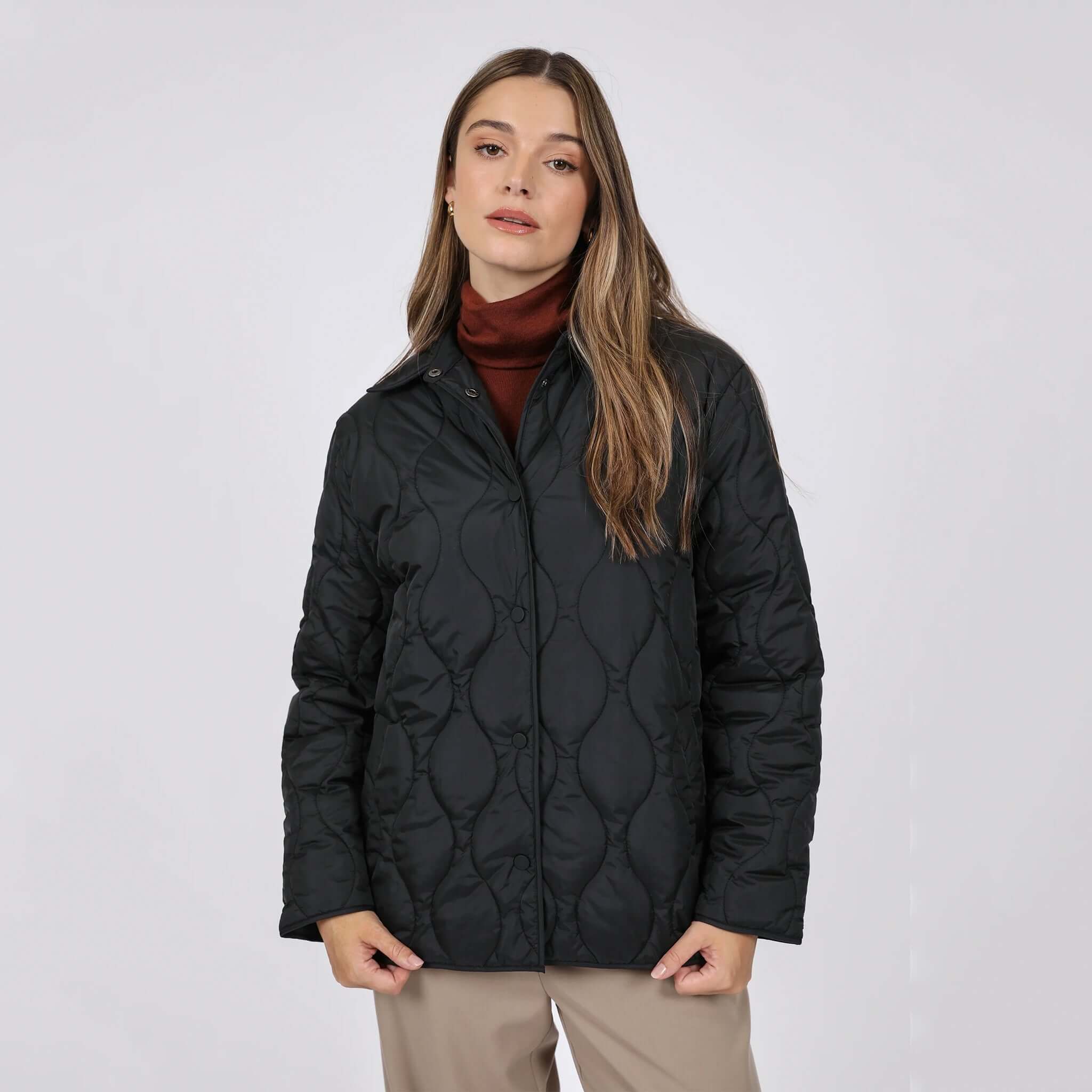 Marlow Toronto Quilted Jacket - Black worn by a model, showcasing its modern wave-quilted design and relaxed silhouette.