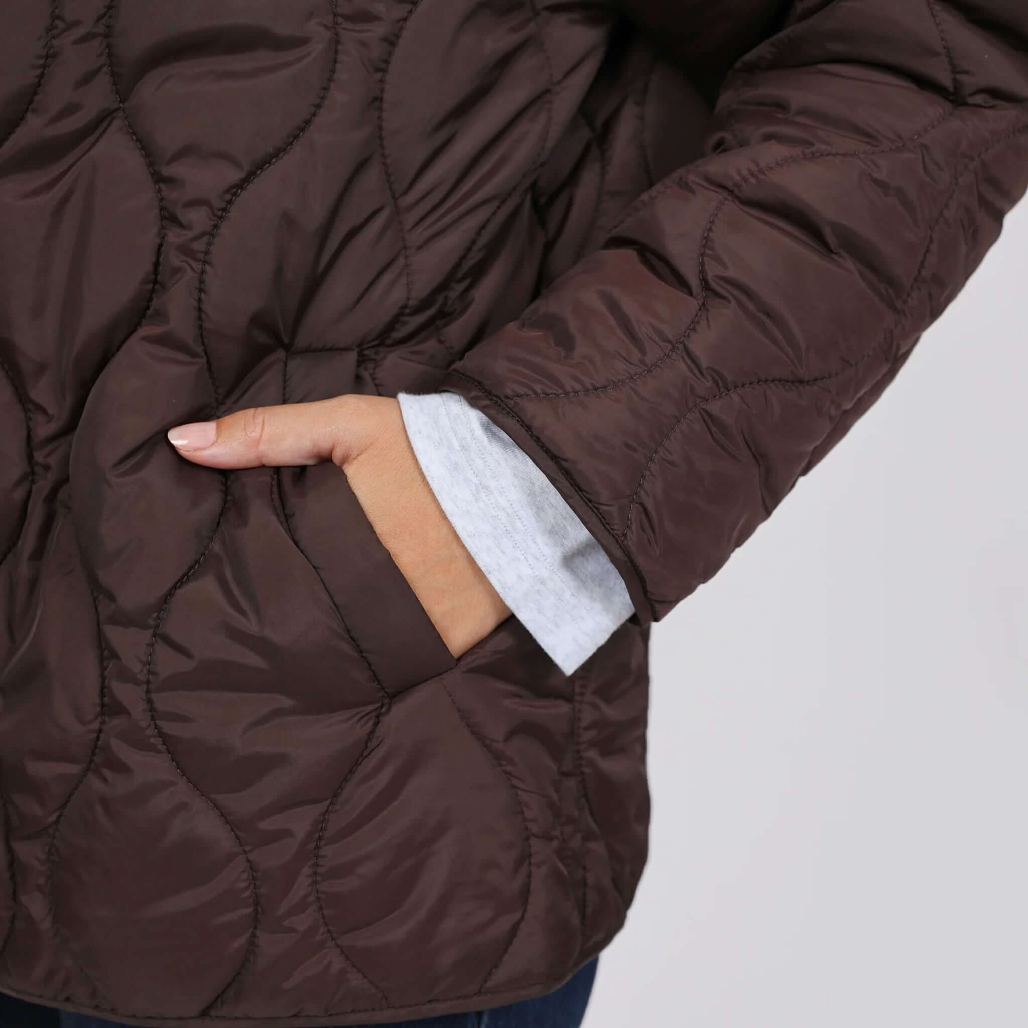 Marlow Toronto Quilted Jacket - Java showcasing the cozy pocket and quilted design in a stylish brown color.