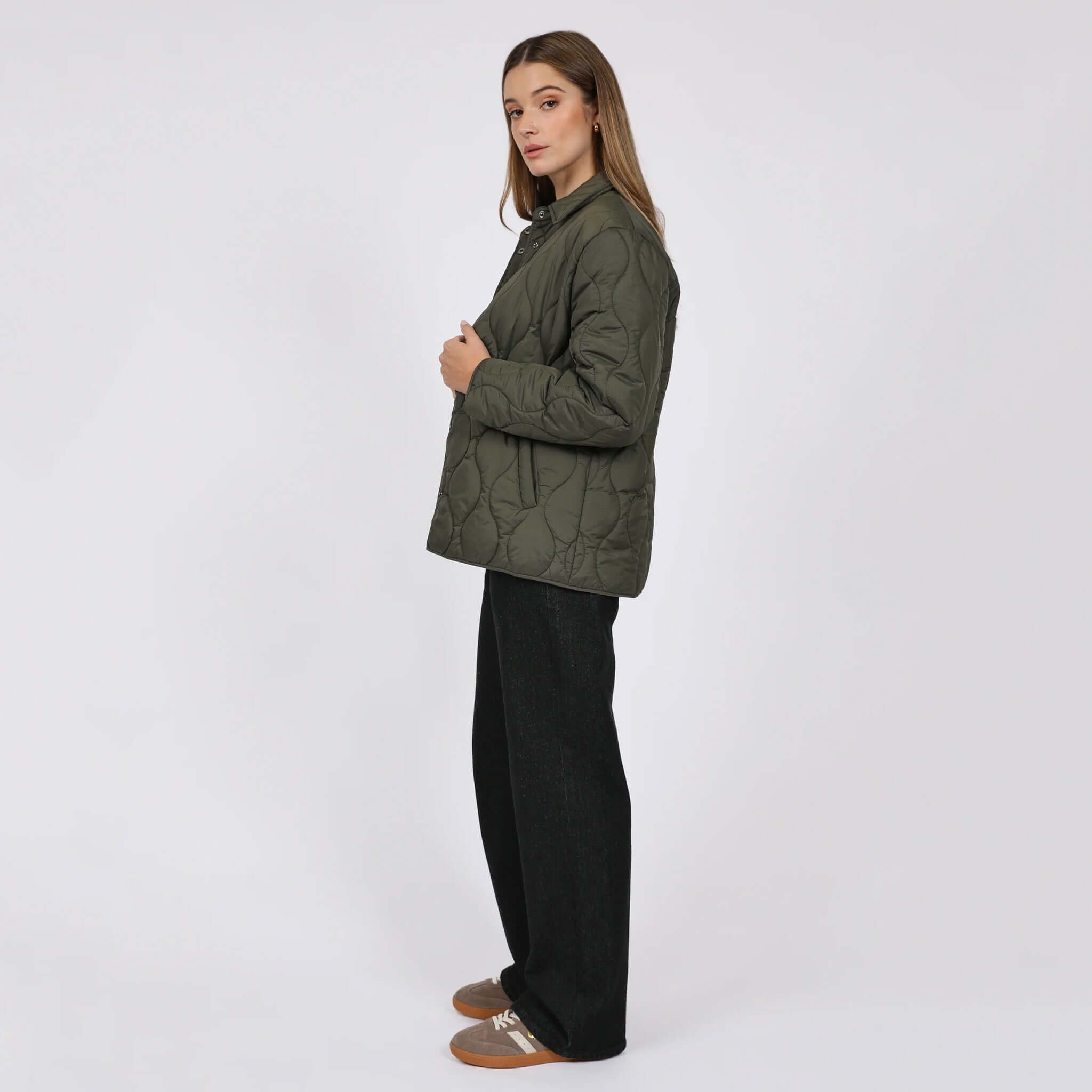 Marlow Toronto Quilted Jacket - Spruce displayed on a model, showcasing its modern quilted design and relaxed fit.