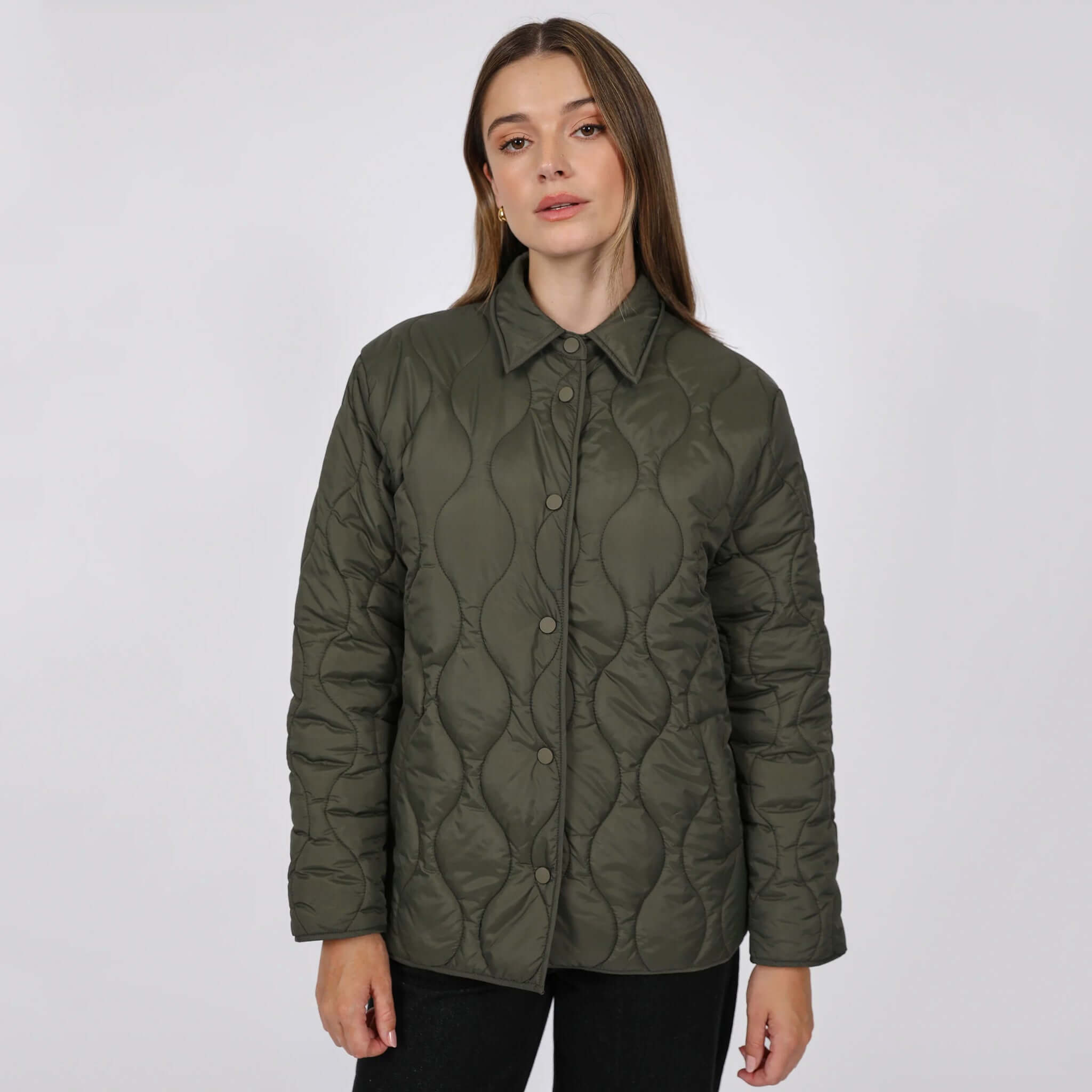 Marlow Toronto Quilted Jacket - Spruce worn by a model, showcasing its quilted design and medium-weight warmth.