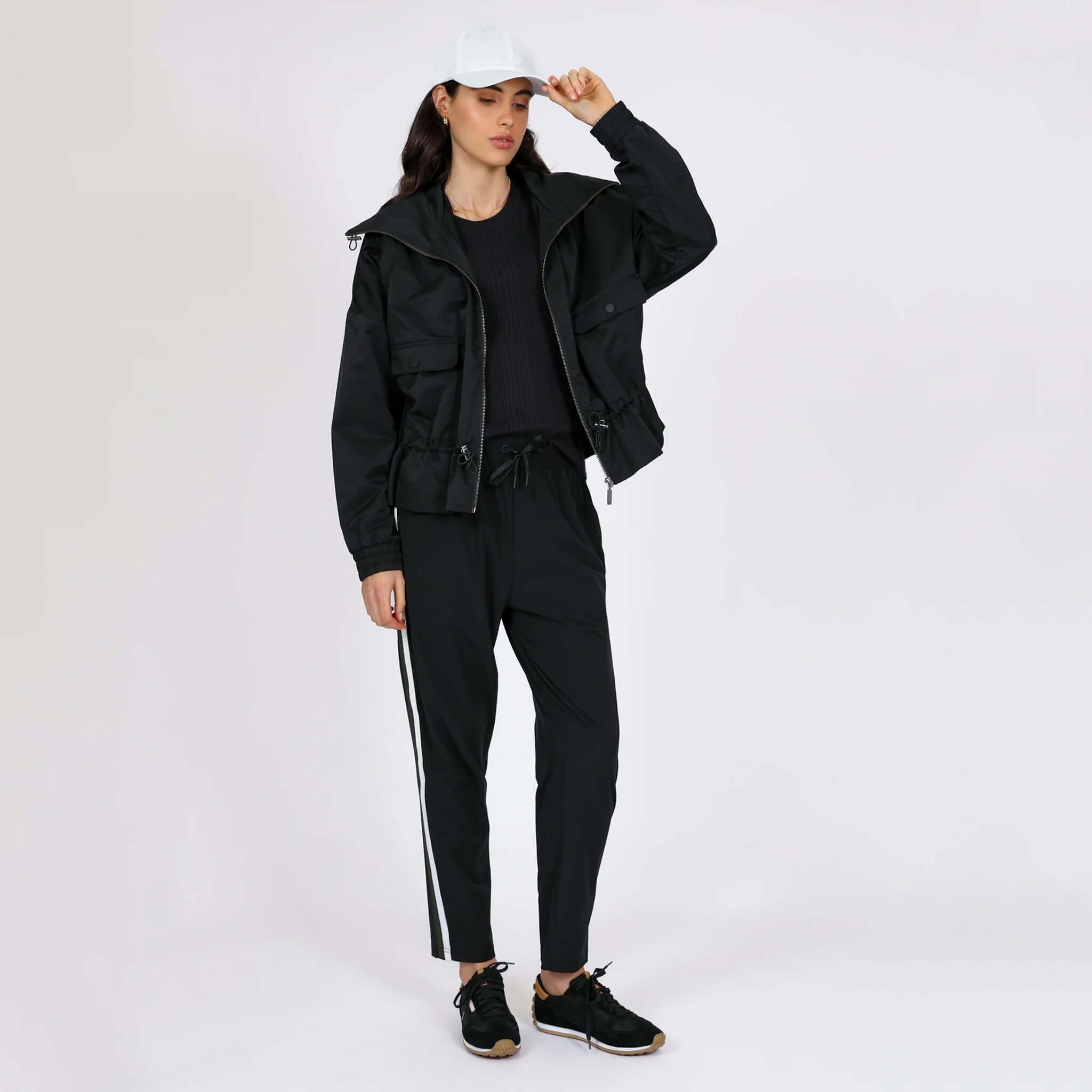 Marlow Transit Pants - Black on model, featherlight stretch travel pants for breathable, quick-dry, wrinkle-resistant comfort