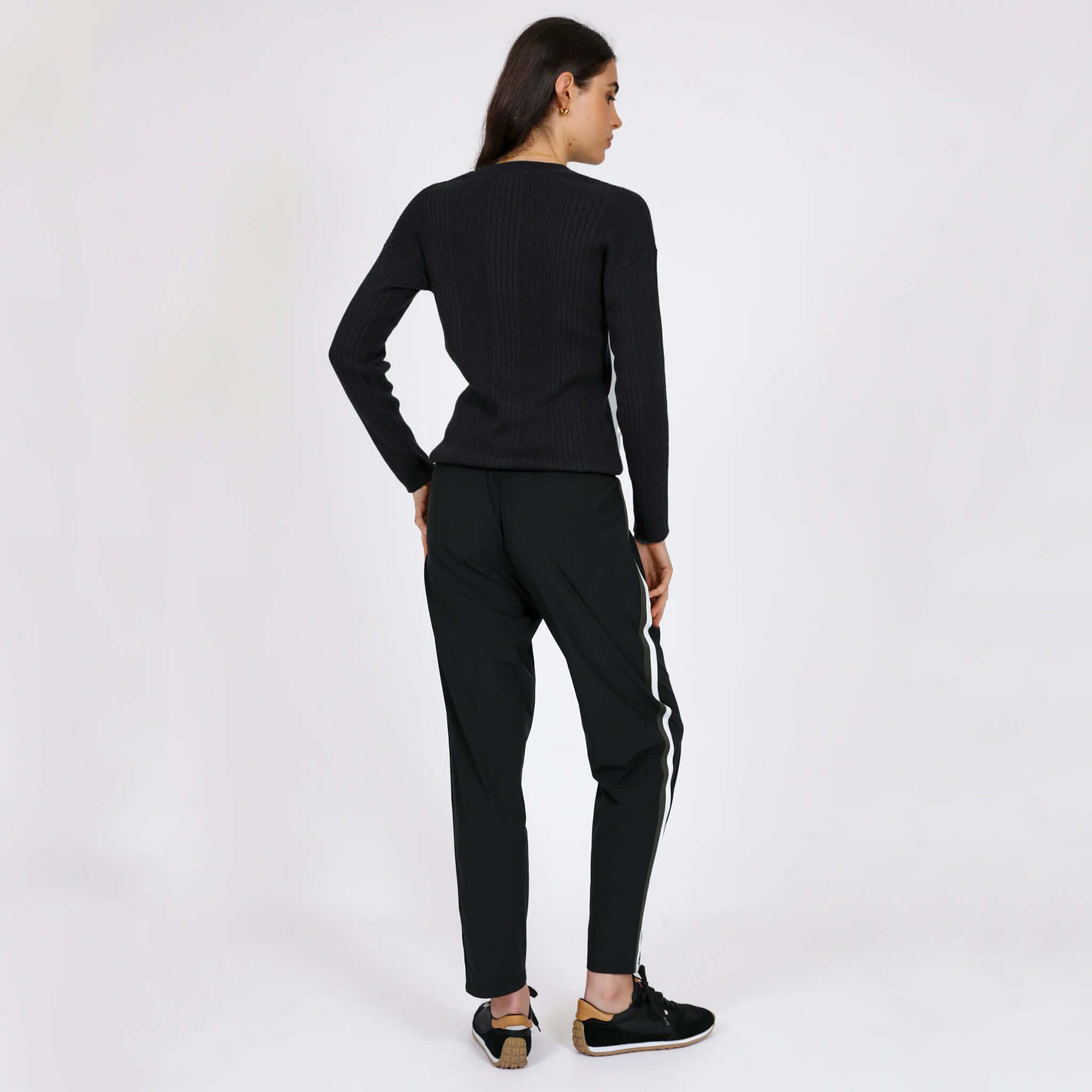 Alt Tag: Marlow Transit Pants - Black back view on model, featherlight stretch travel pants, quick-dry breathable wrinkle-resistant fit