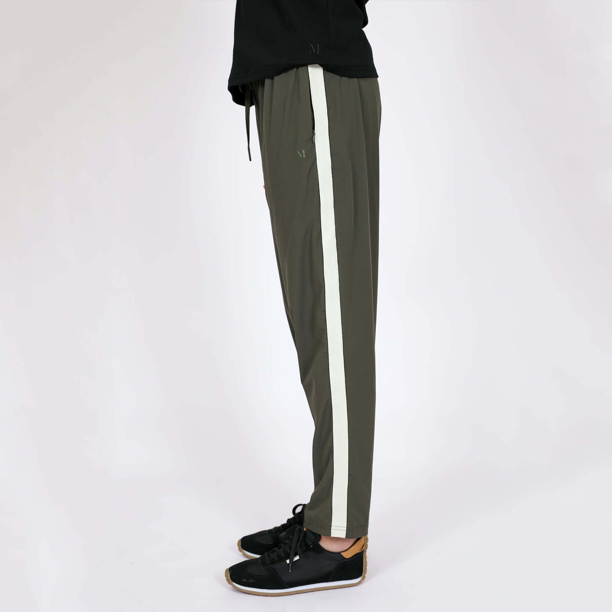 Alt Tag: Marlow Transit Pants - Olive side view, featherlight stretch travel pants with stripe detail, breathable quick-dry wrinkle-resistant