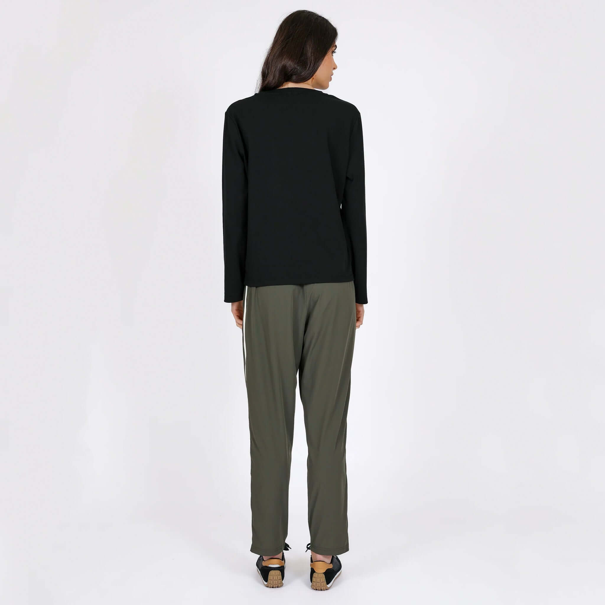 Alt Tag: Marlow Transit Pants - Olive back view on model, lightweight featherlight stretch travel pants, breathable quick-dry wrinkle-resistant