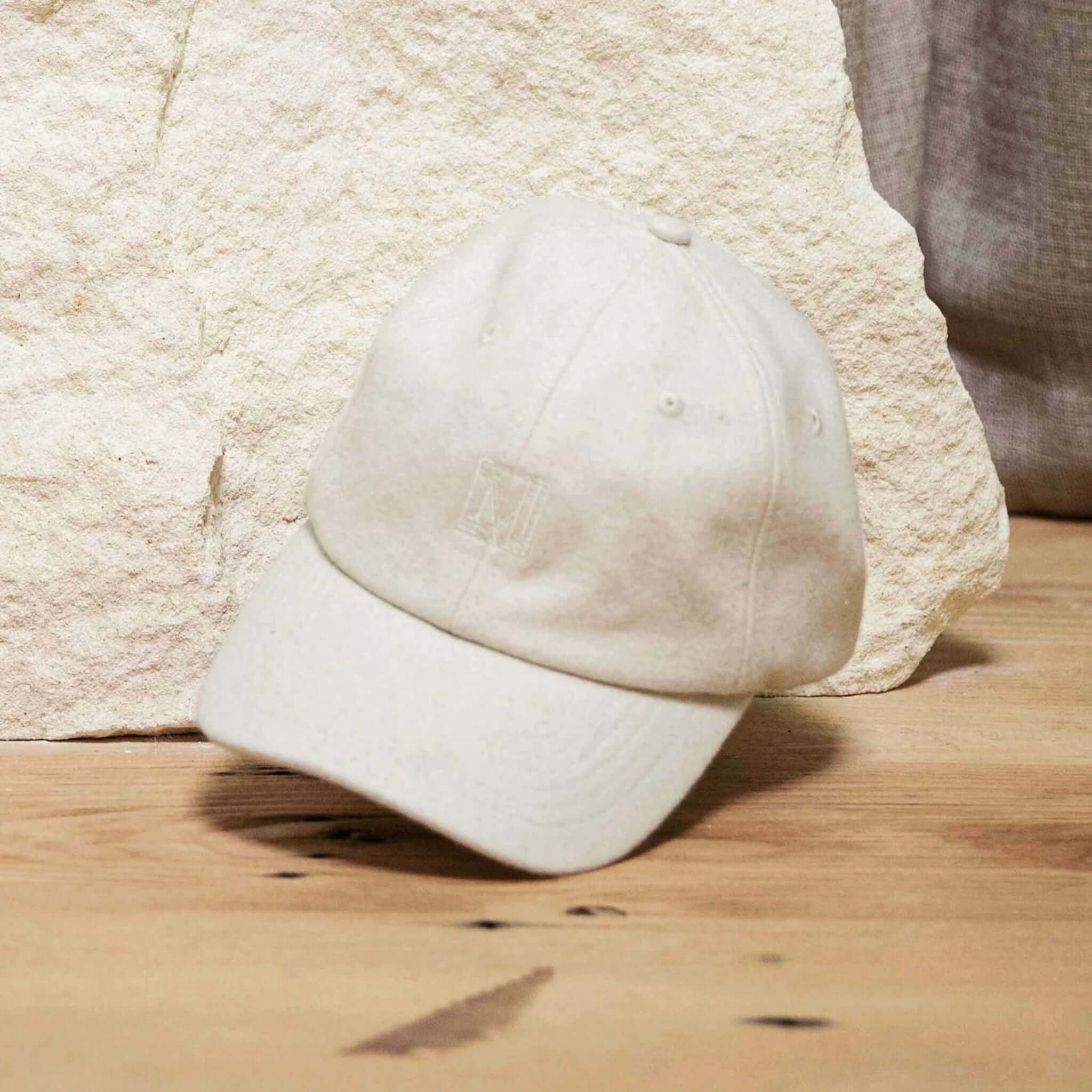 Alt Tag: Marlow Wool Cap in ivory wool blend, classic 6-panel women’s cap with adjustable strap and breathable eyelets