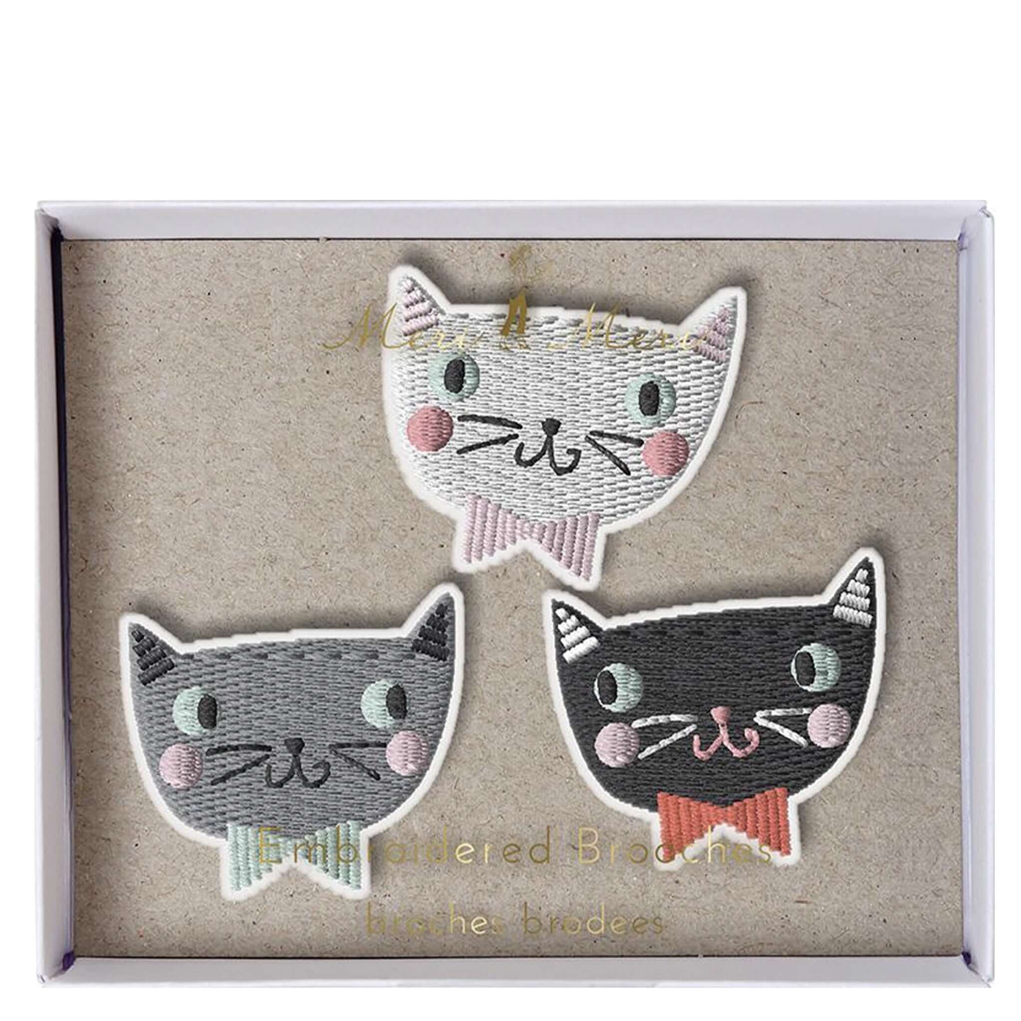 Alt Tag: Meri Meri Embroidered Brooch Set - Cats with 3 embroidered cat brooches featuring whiskers, rosy cheeks and bow ties