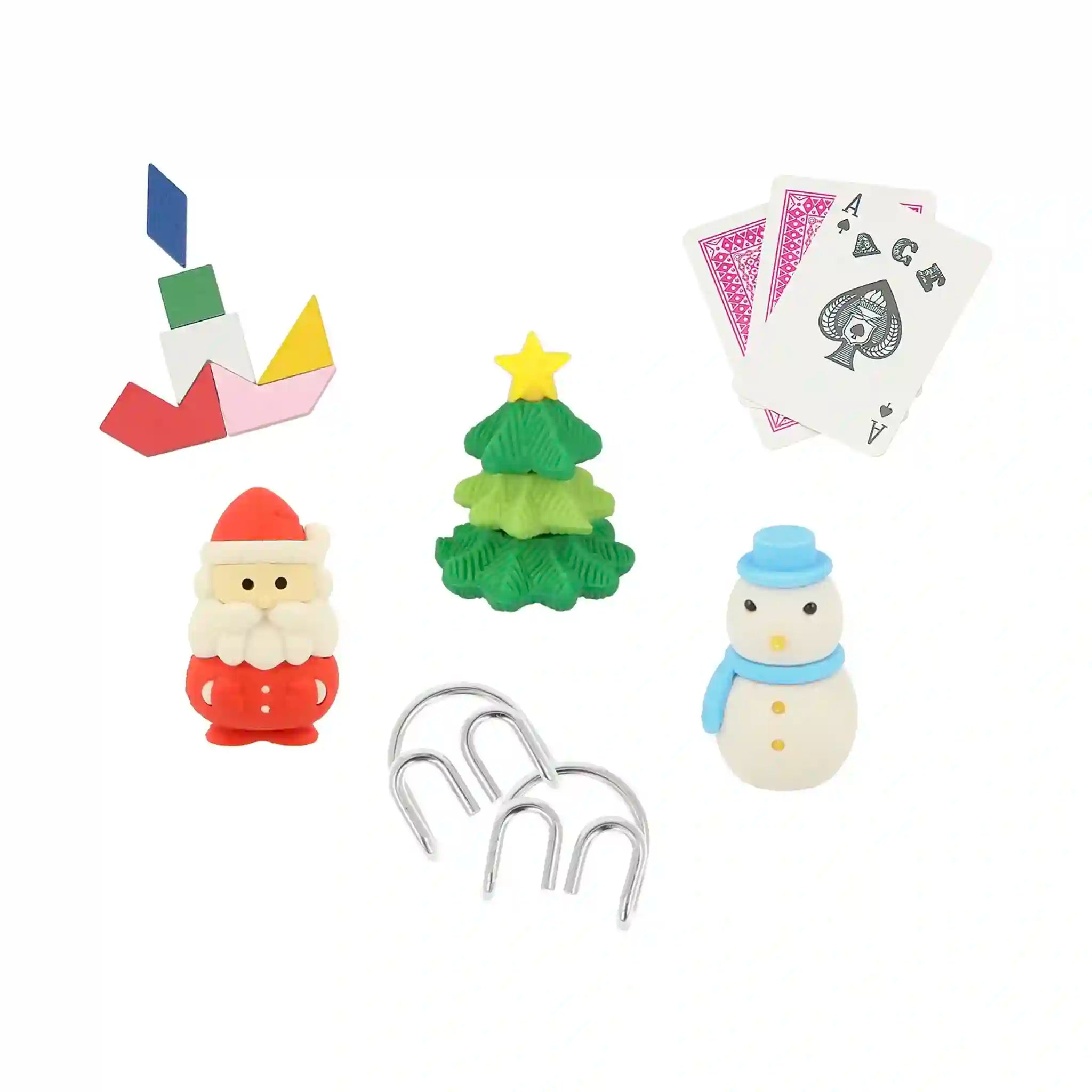 Set of Christmas-themed desk accessories including a Santa Claus, Christmas tree, snowman, and playing card.