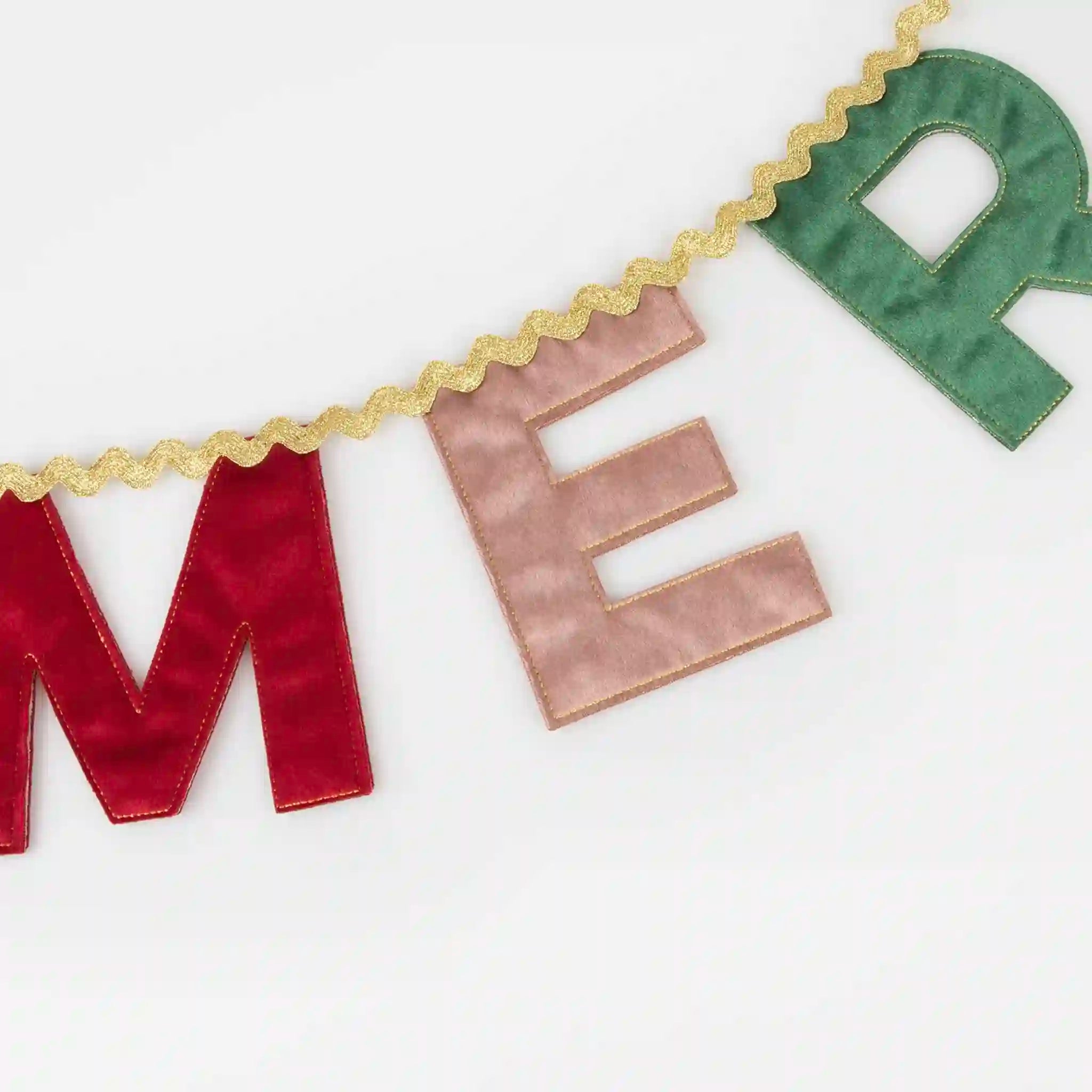Decorative banner with colorful letters spelling 'ME' on a white background