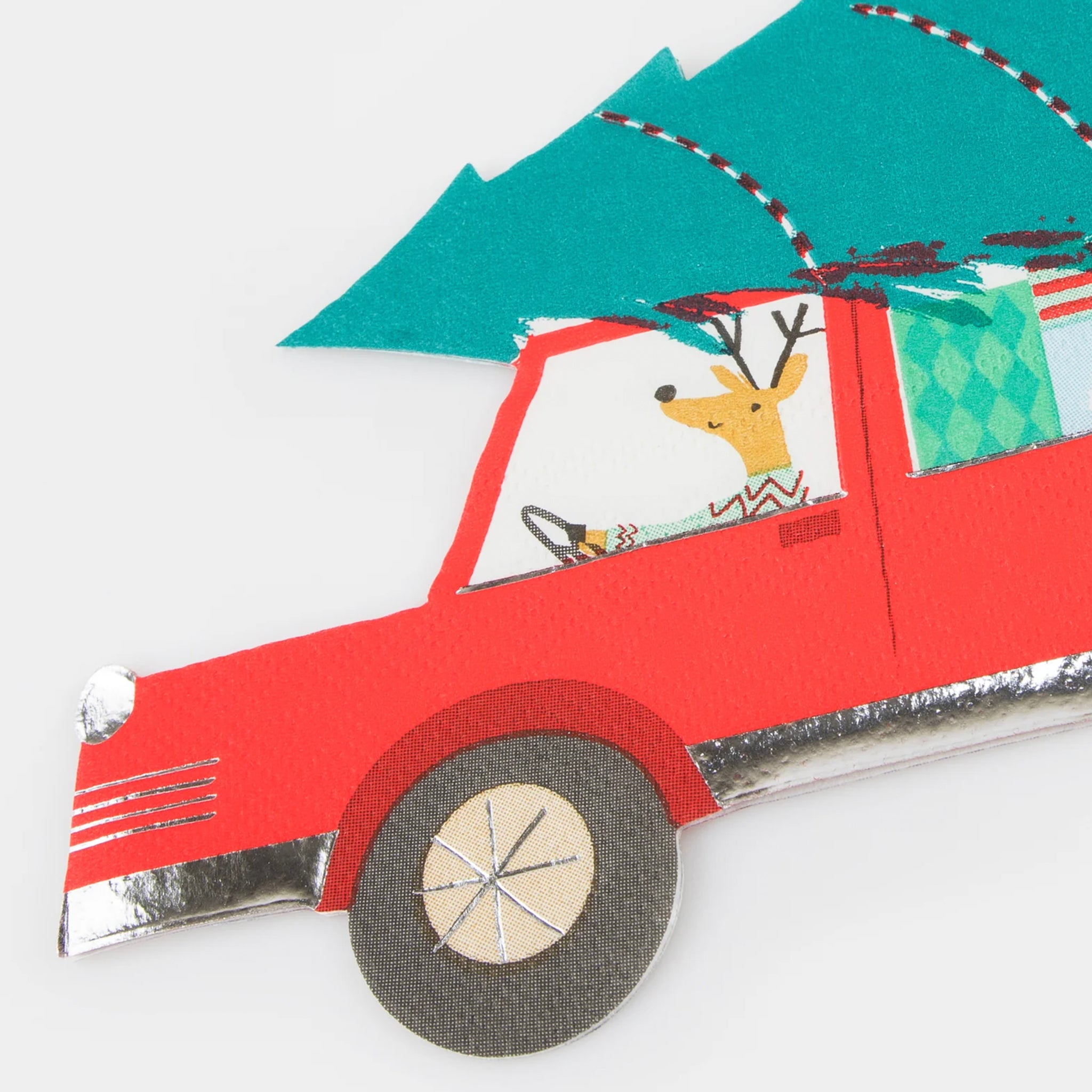 Reindeer driving a car with a Christmas Tree on top paper napkins.