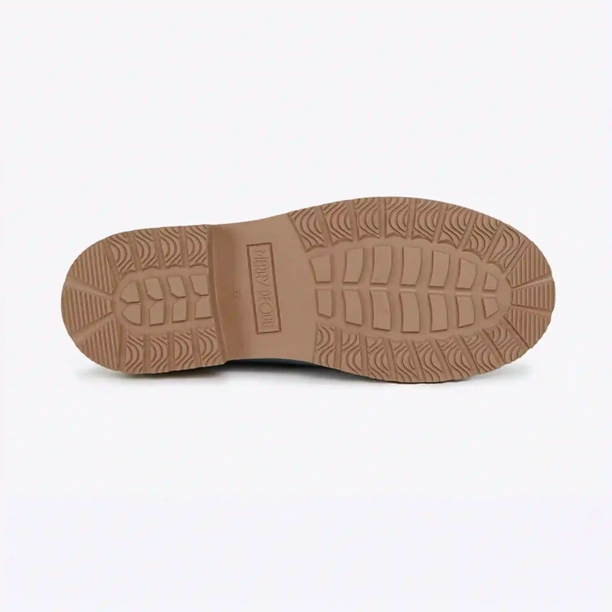 Brown shoe sole with tread pattern on a white background