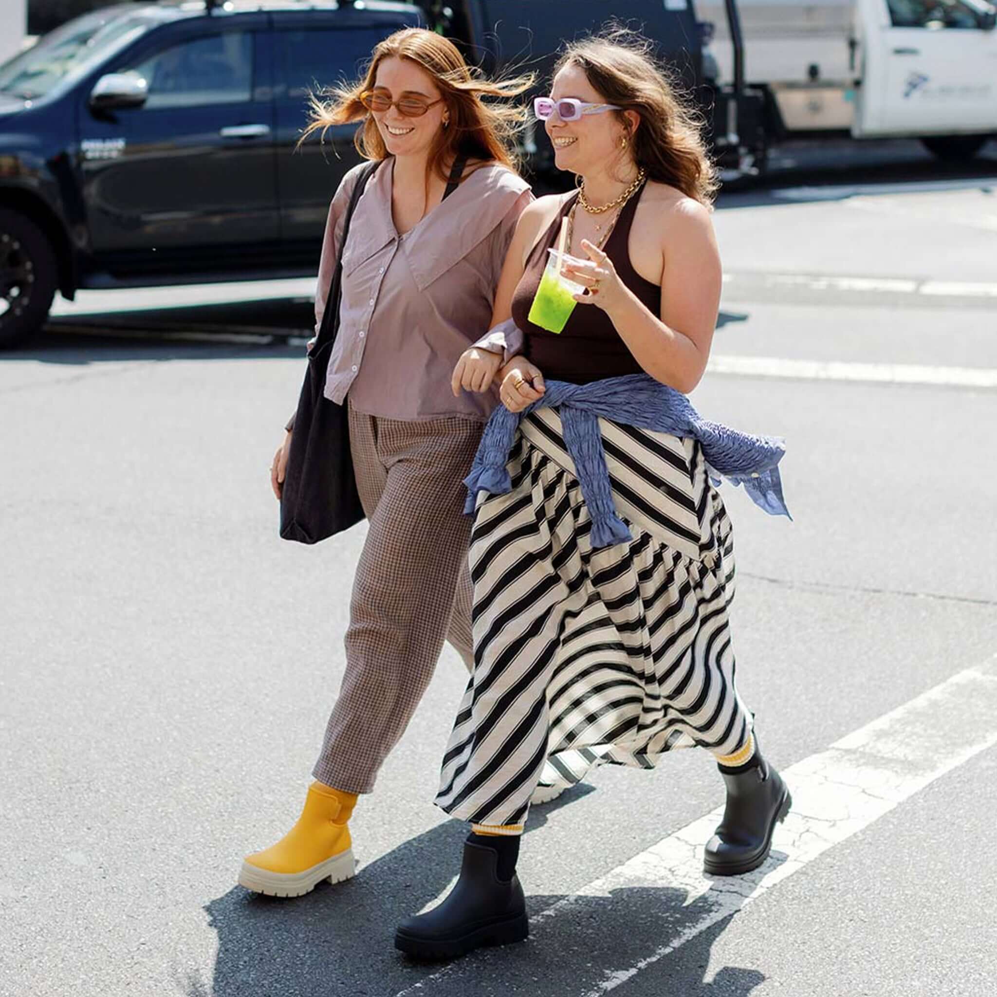 Merry People Tully Boots - Black worn in street style look, waterproof vegan platform gumboots with neoprene cuff and arch support