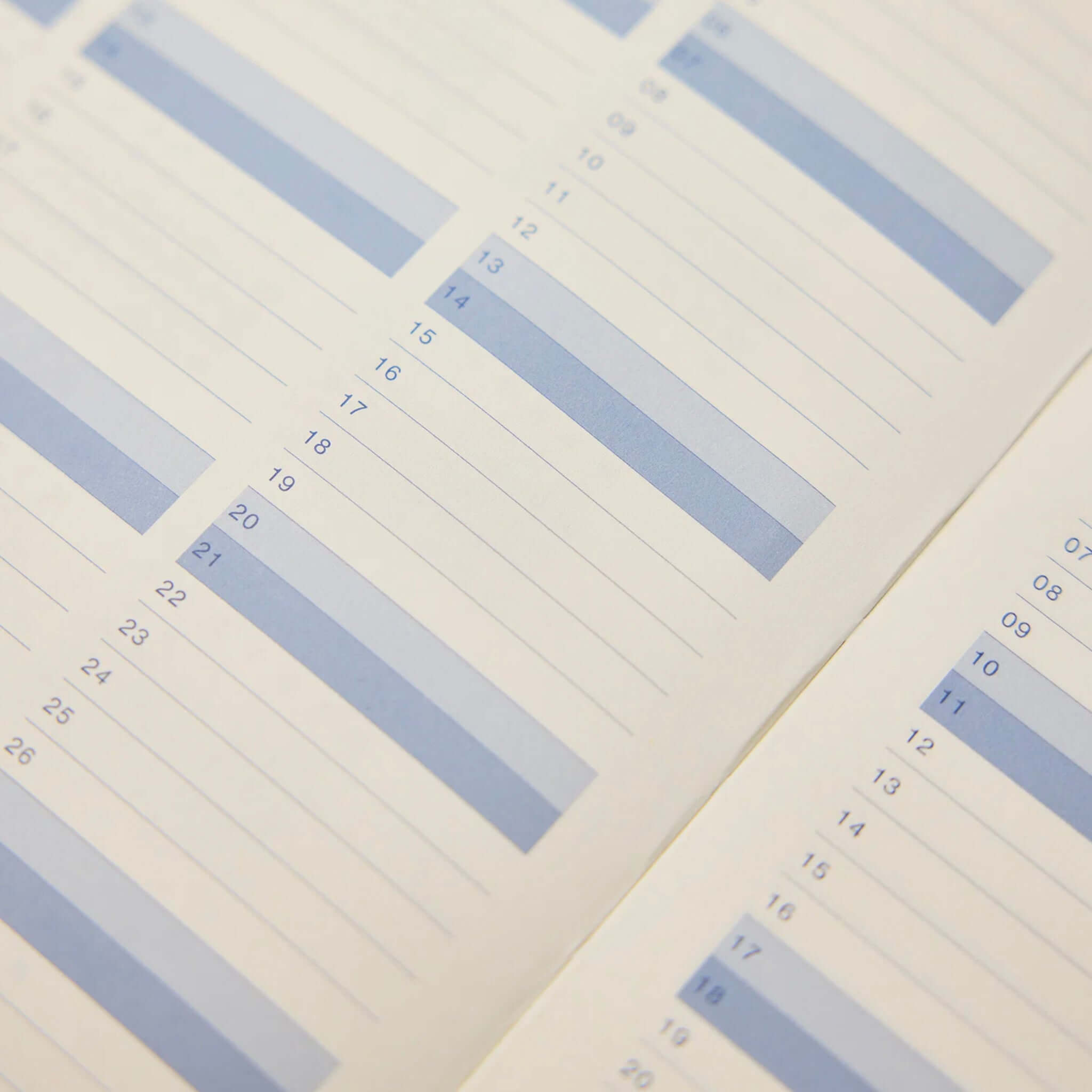 Milligram Any Day Now 2027 Weekly Achiever - Pink & Navy planner pages with weekly layout.
