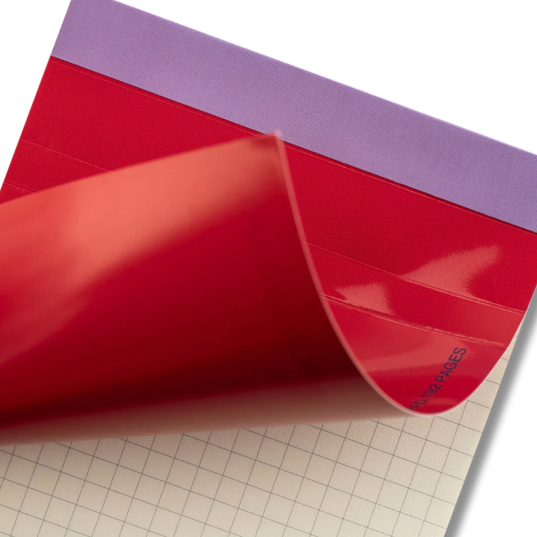 Red vinyl sheet with purple border on a grid background